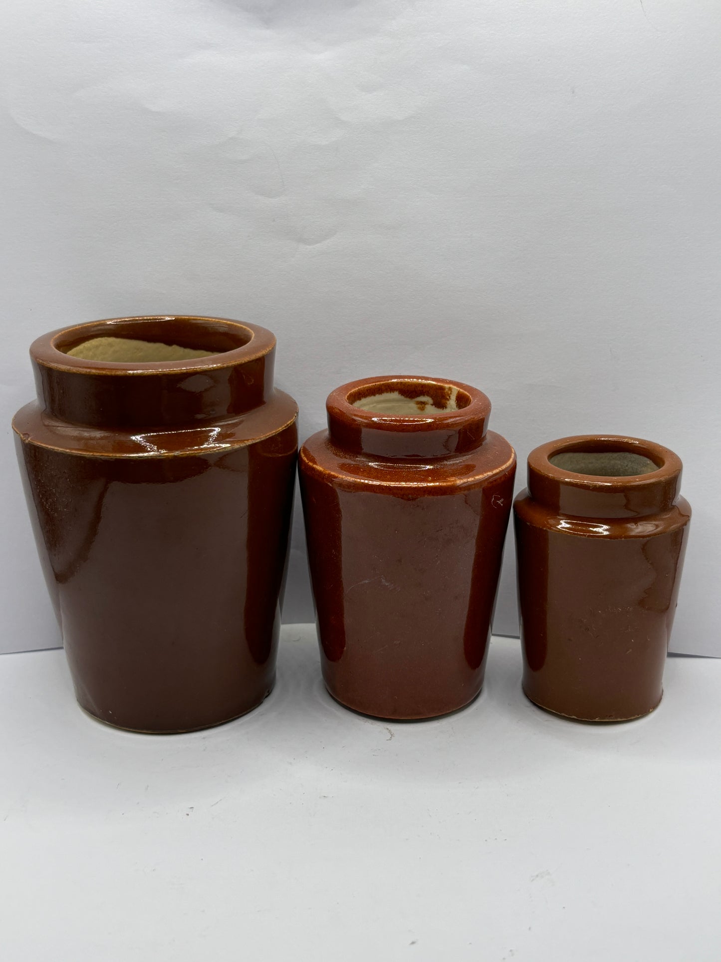 3 old brown stoneware cream pots, creamers