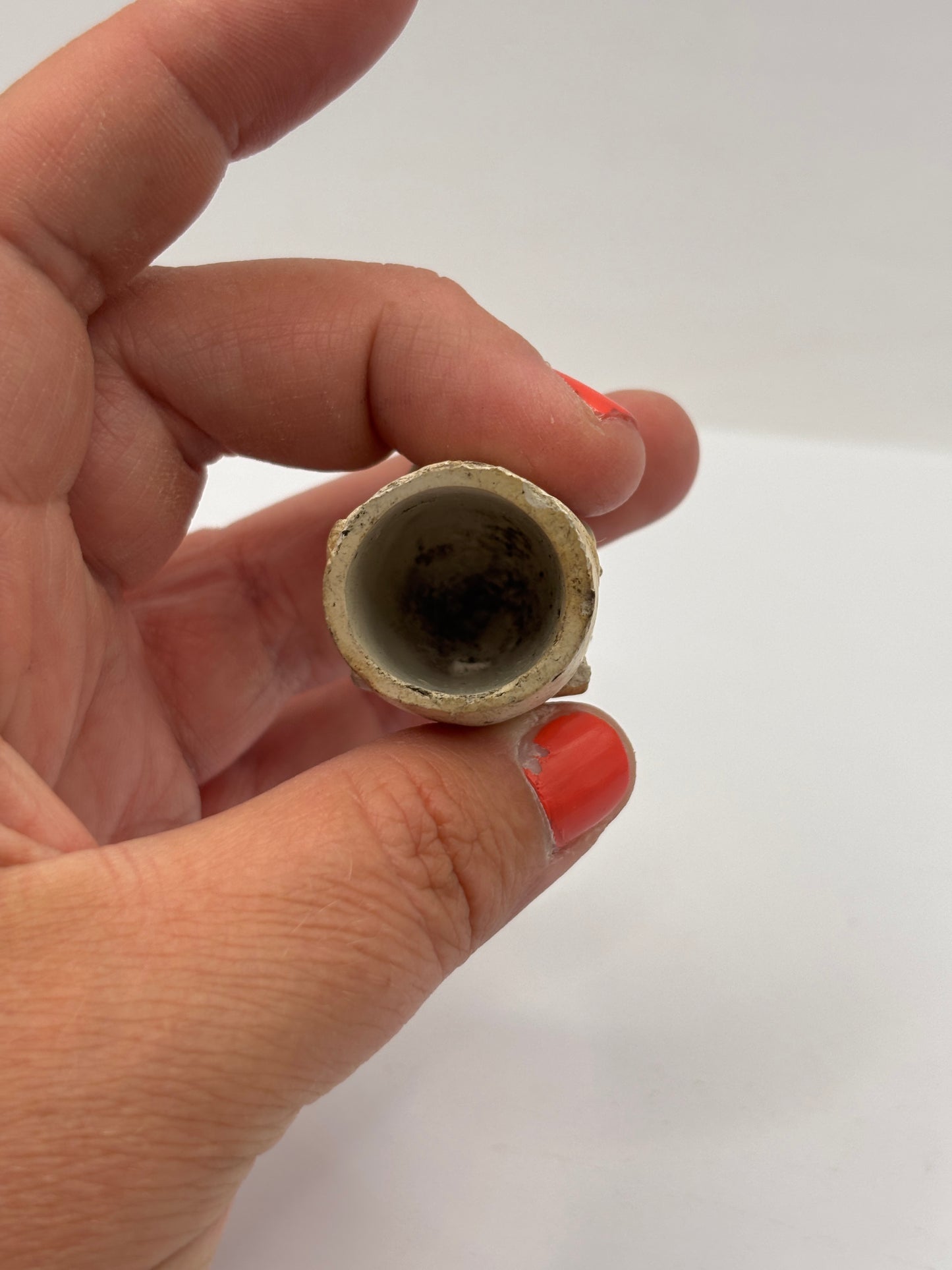 Old figural clay pipe head, pipe bowl. Ally sloper