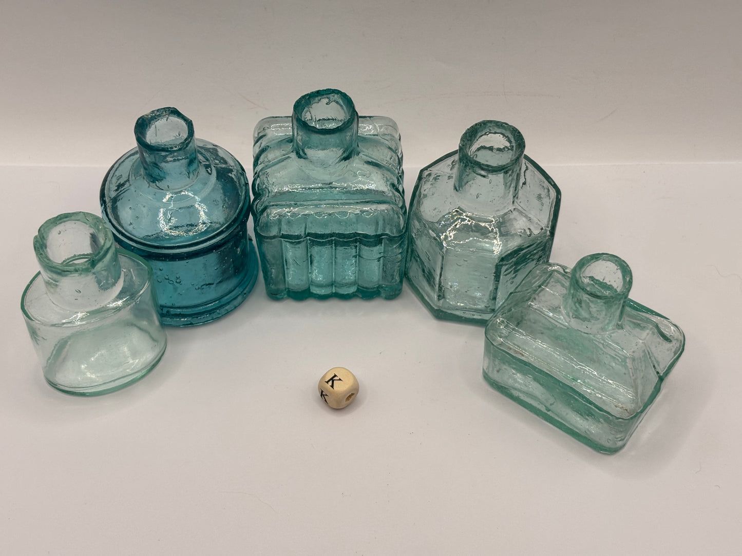 5 old aqua glass inks, inkwells, ink bottles, penny ink (k)