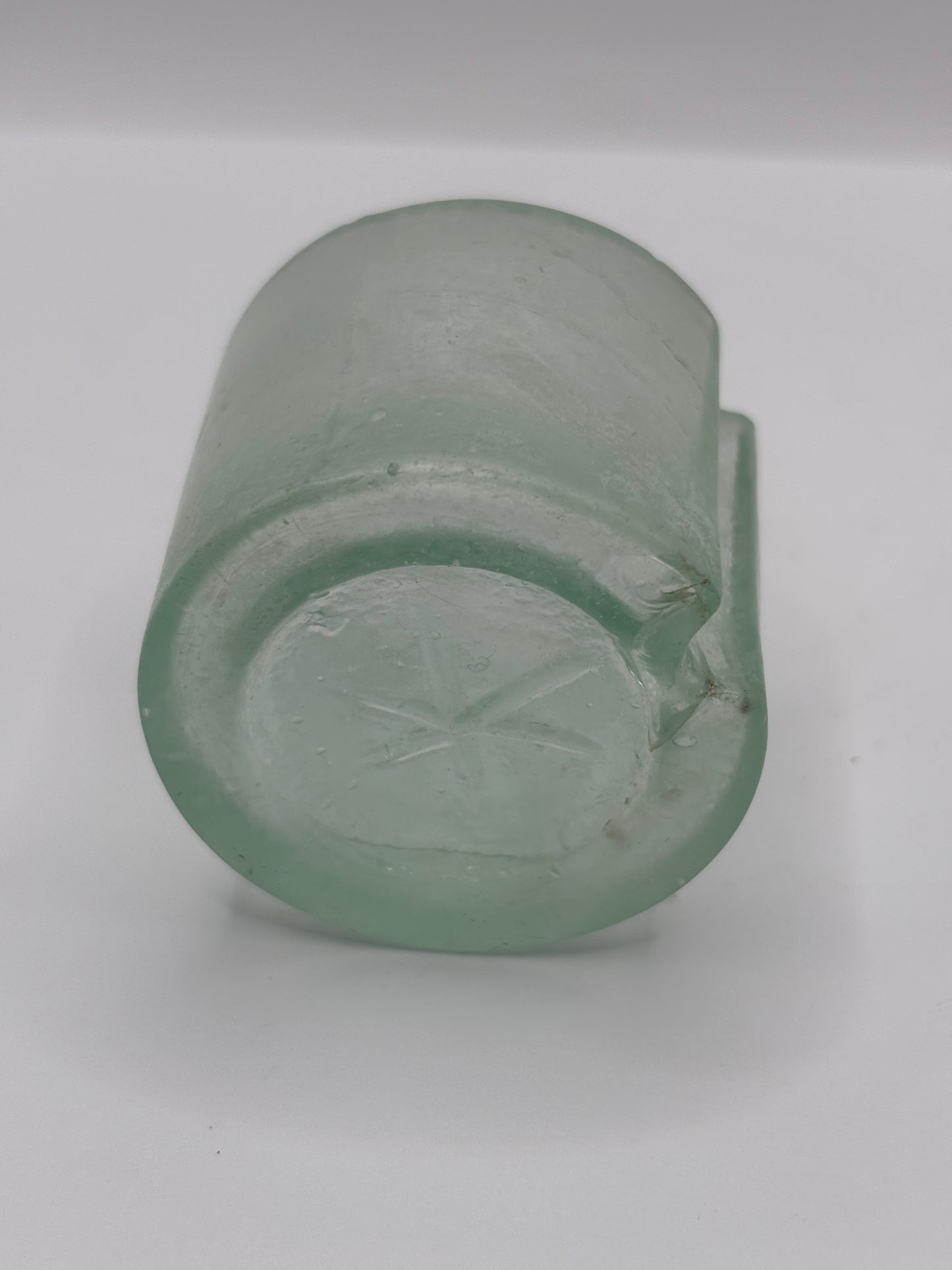 Old aqua glass inkwell, ink bottle with pen rest