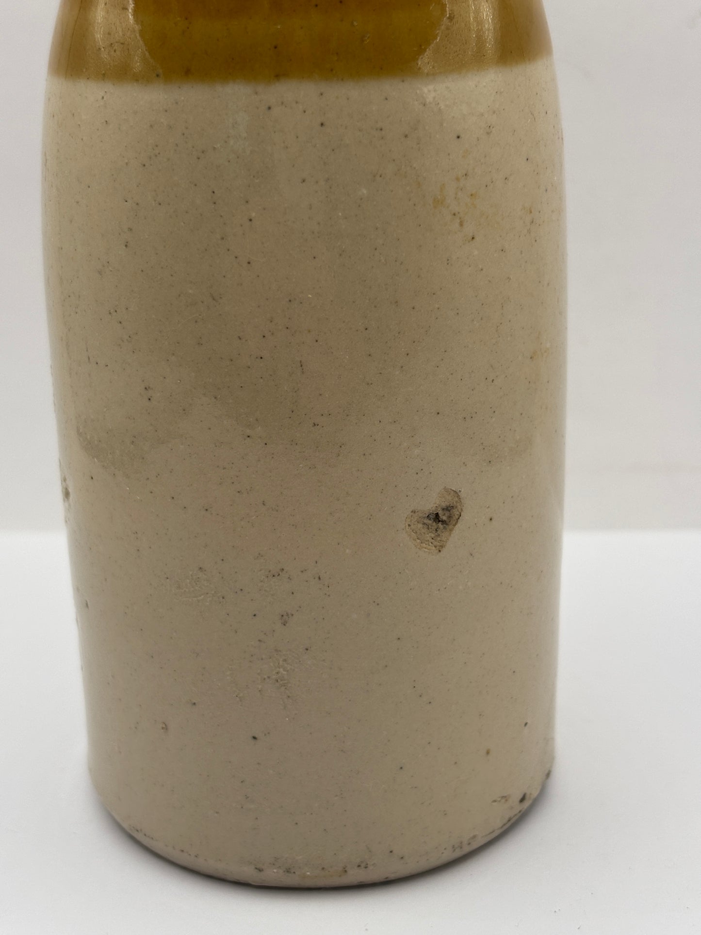 Old stoneware stout bottle, John Mackay & Co