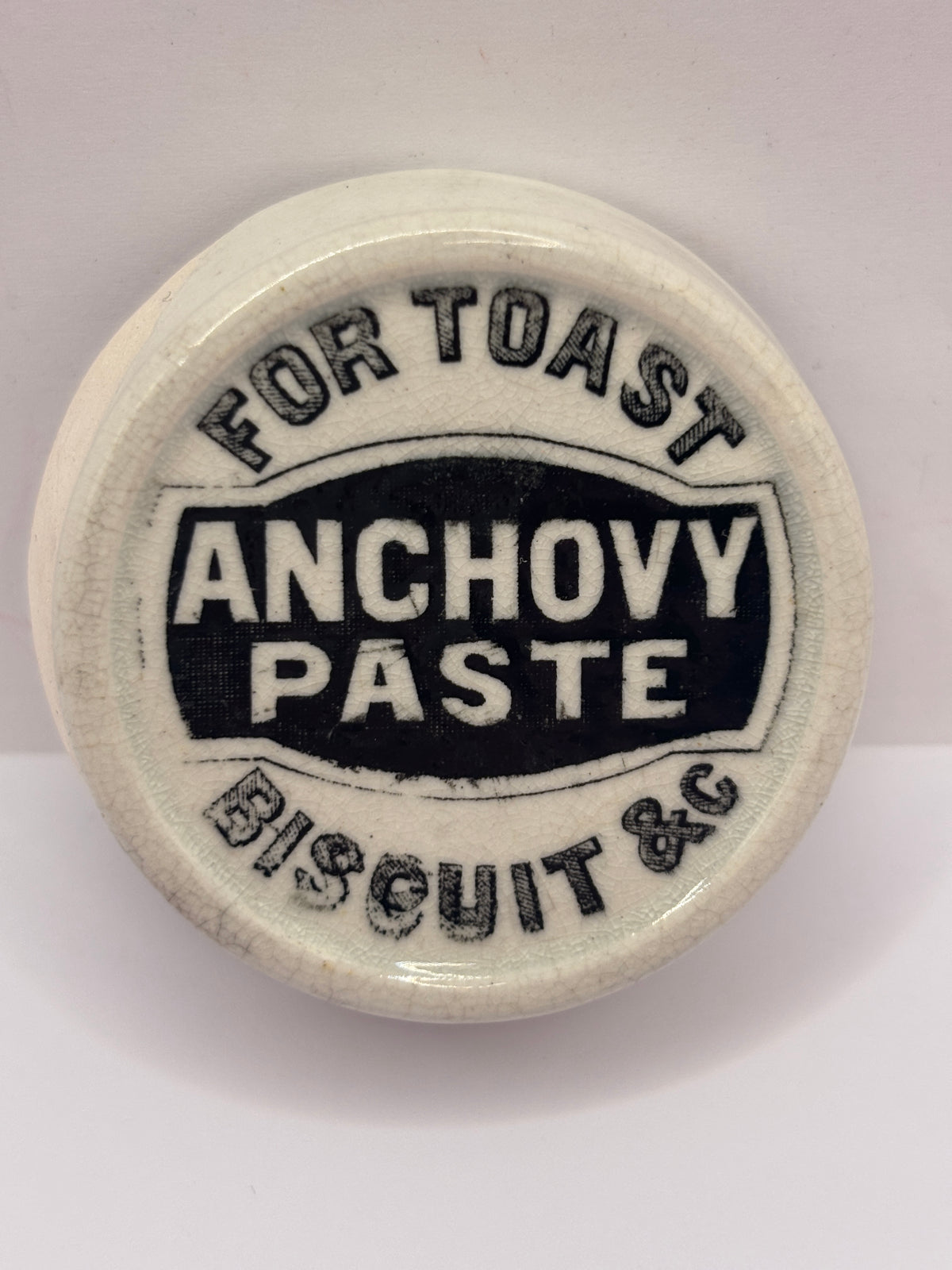 Old advertising lid. Anchovy paste