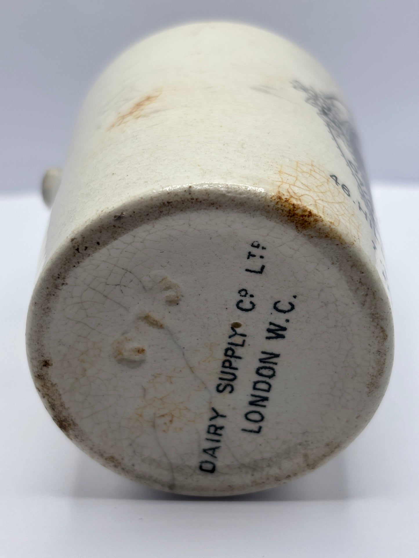 Old stoneware advertising cream pot, J.Clarke & Sons Dairy & Creamery. Restoration project?