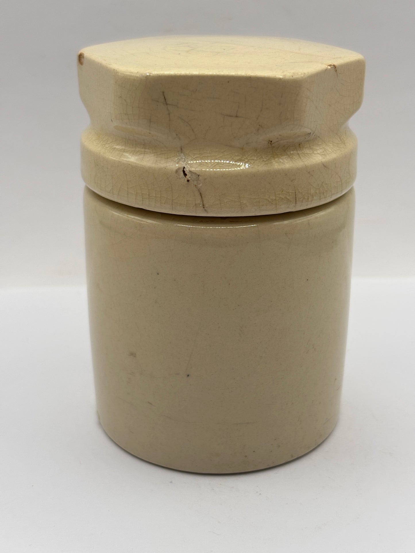 Old stoneware potted meat jar and lid. Blanchflower. Damaged