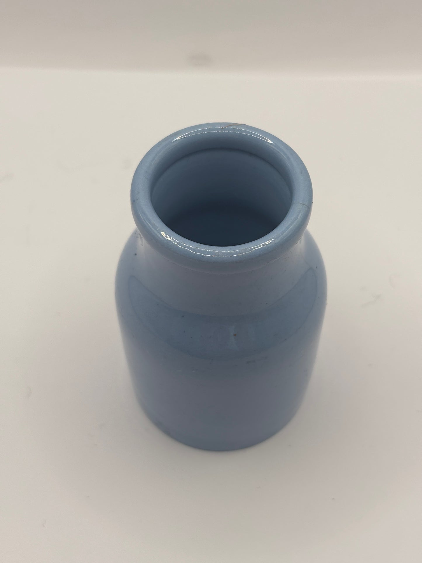 Old small blue stoneware jar