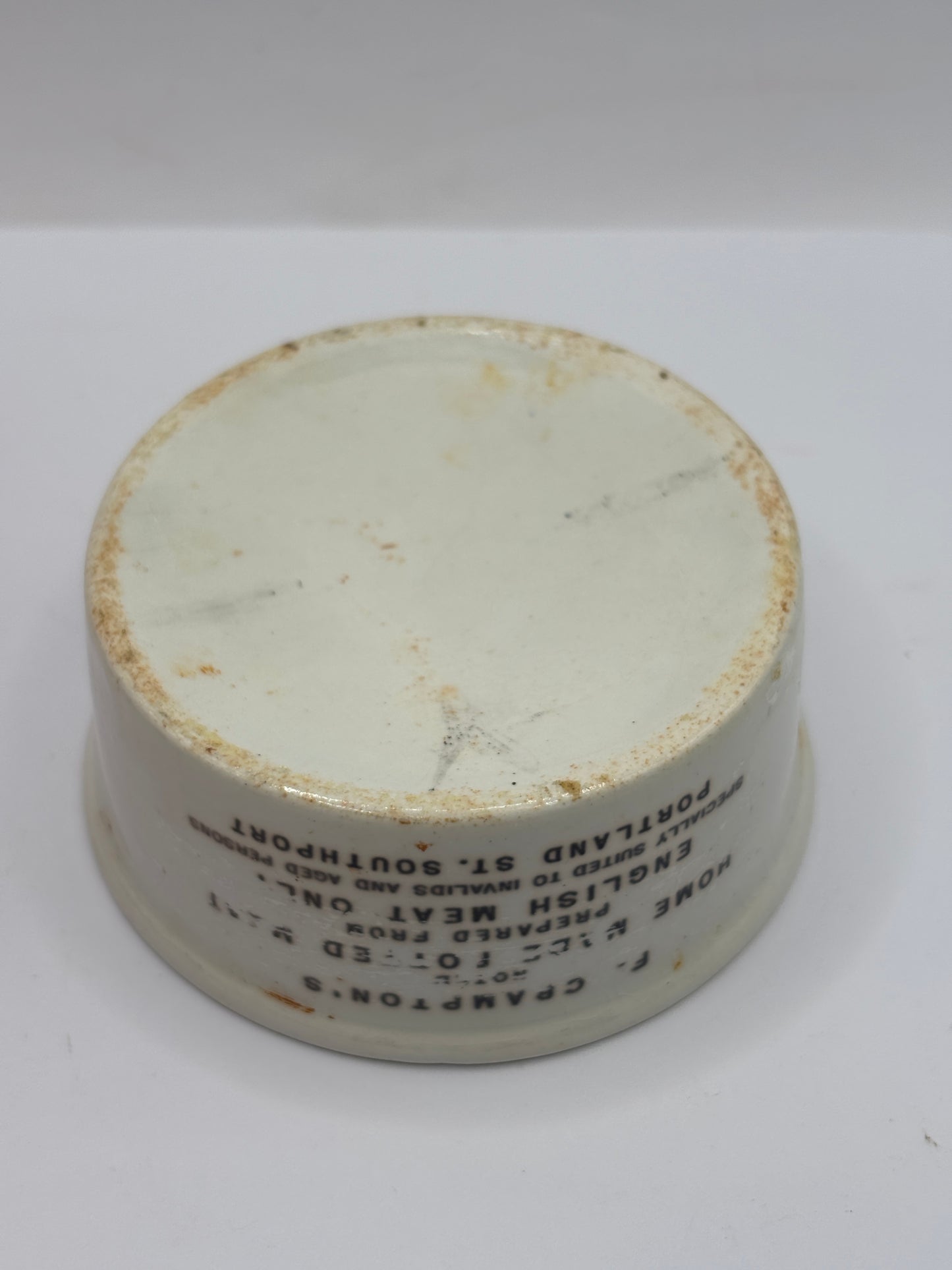 Old advertising meat paste pot. Black print, Cramptons