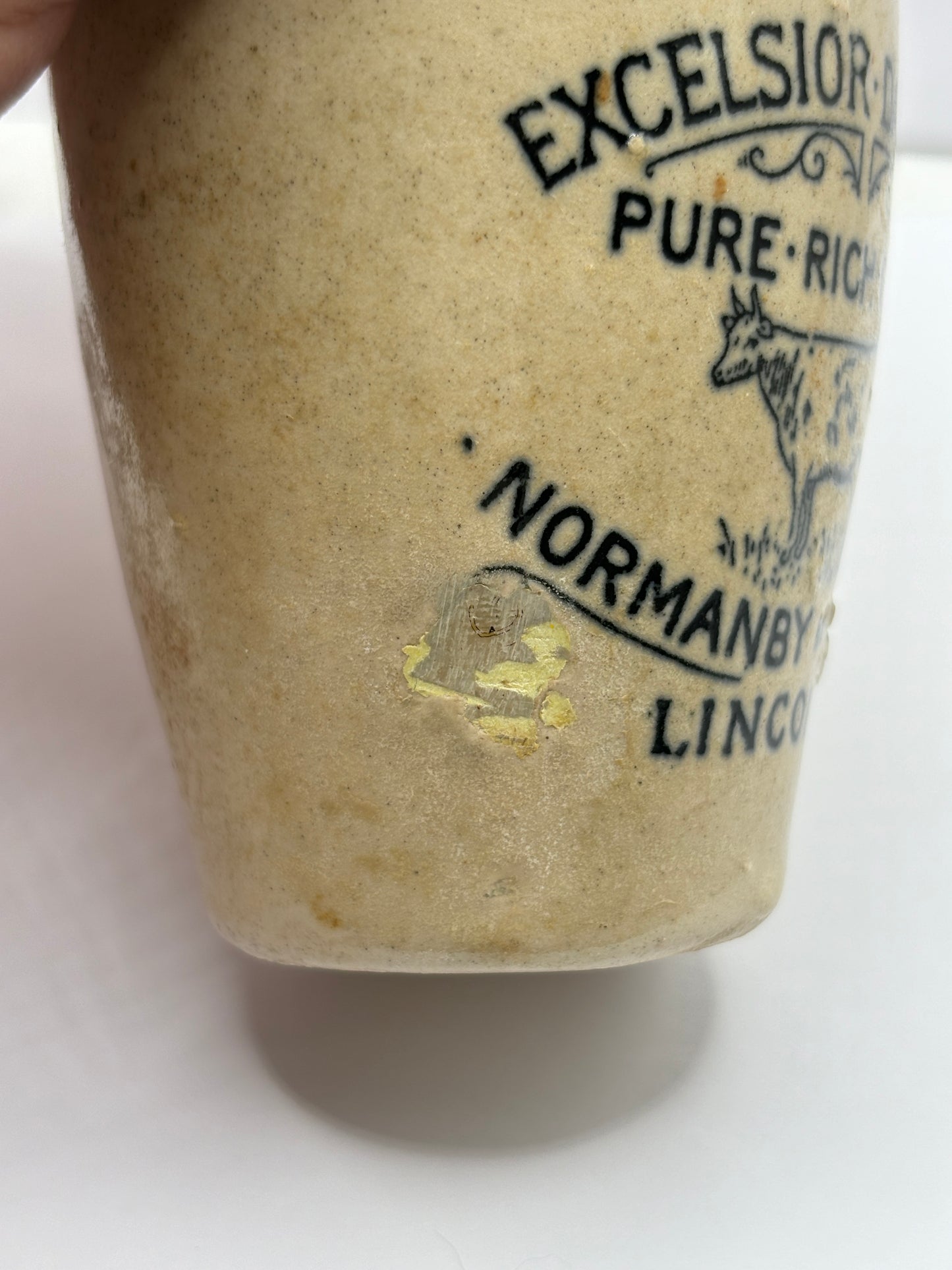 Excelsior dairy Co, Lincoln cream pot. Repaired