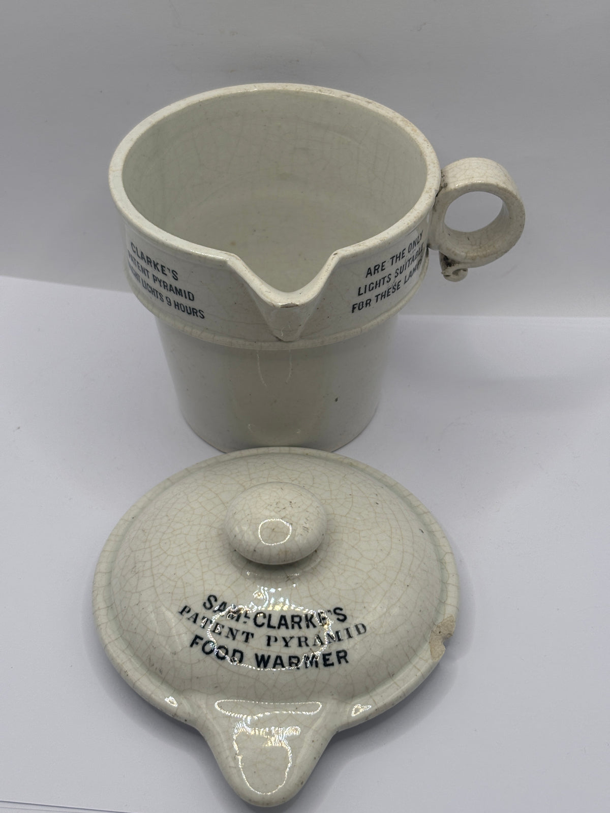 Old stoneware advertising food warmer, Clarkes pyramid food warmer & lid