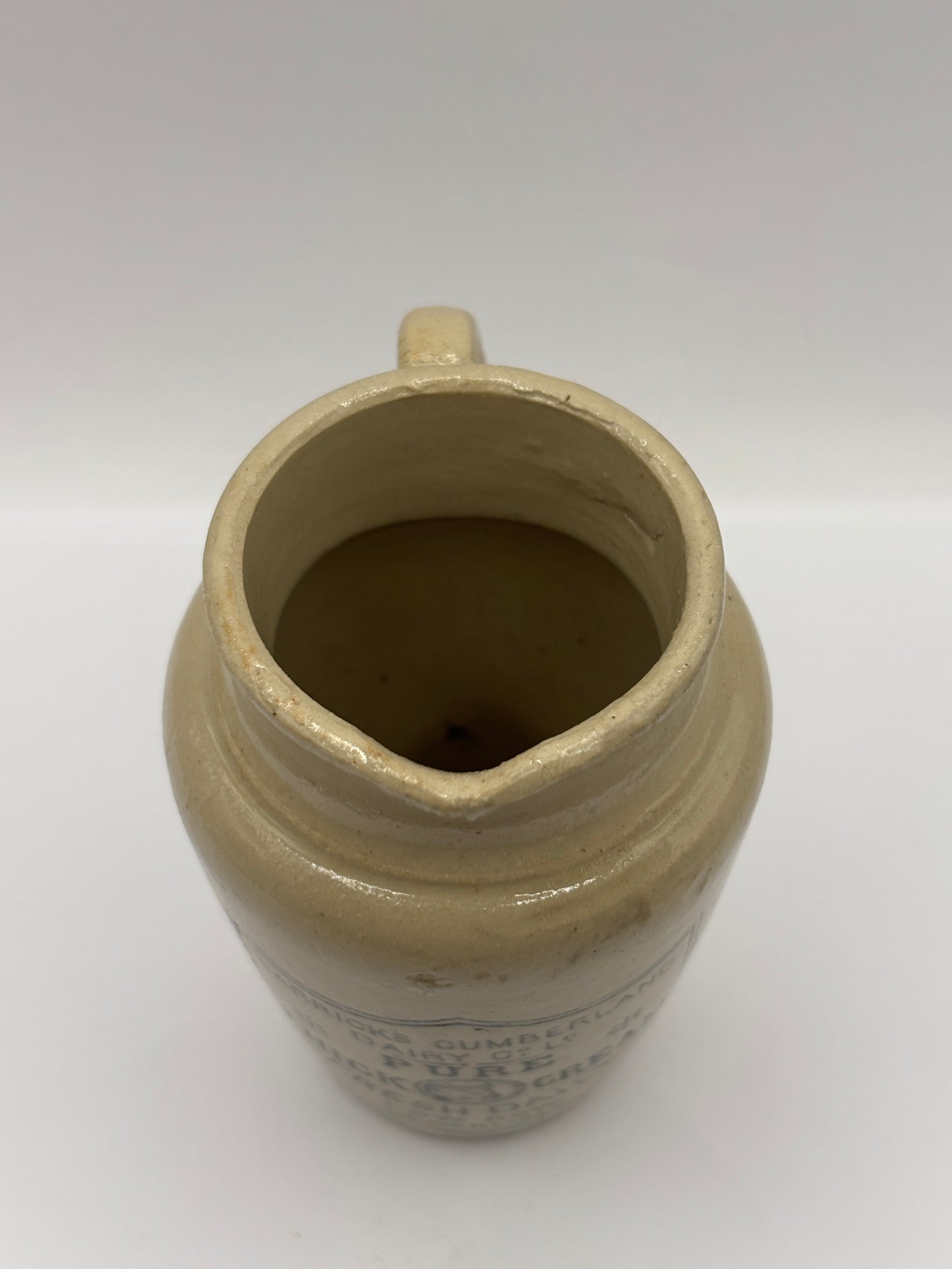 Old advertising cream pot, Carricks pure thick cream with handle. Black print 10cms