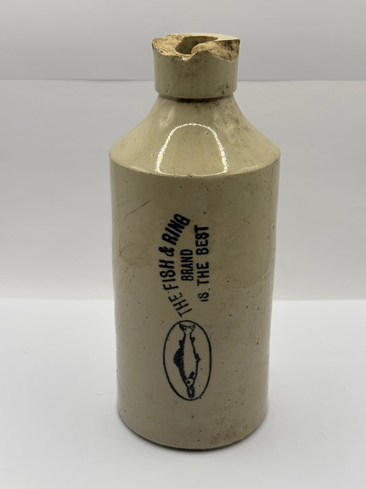 Old stoneware Fish & Ring brand advertising bottle. Damaged