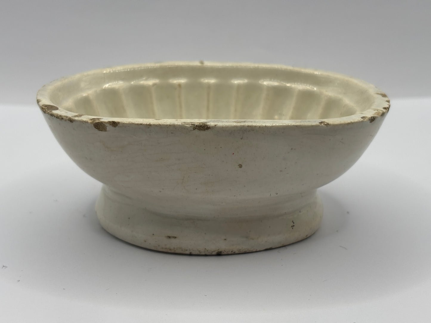 Old mini white stoneware jelly mould, fish design