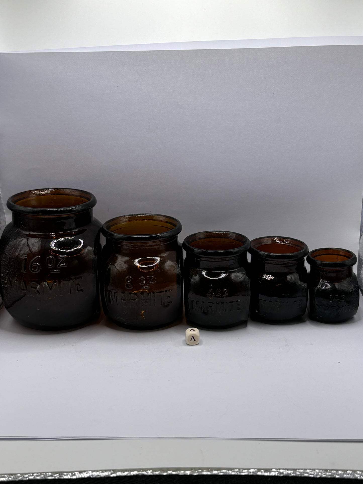 5 old amber glass marmite jars (a)