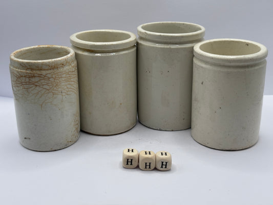 4 small stoneware pots (HHH)