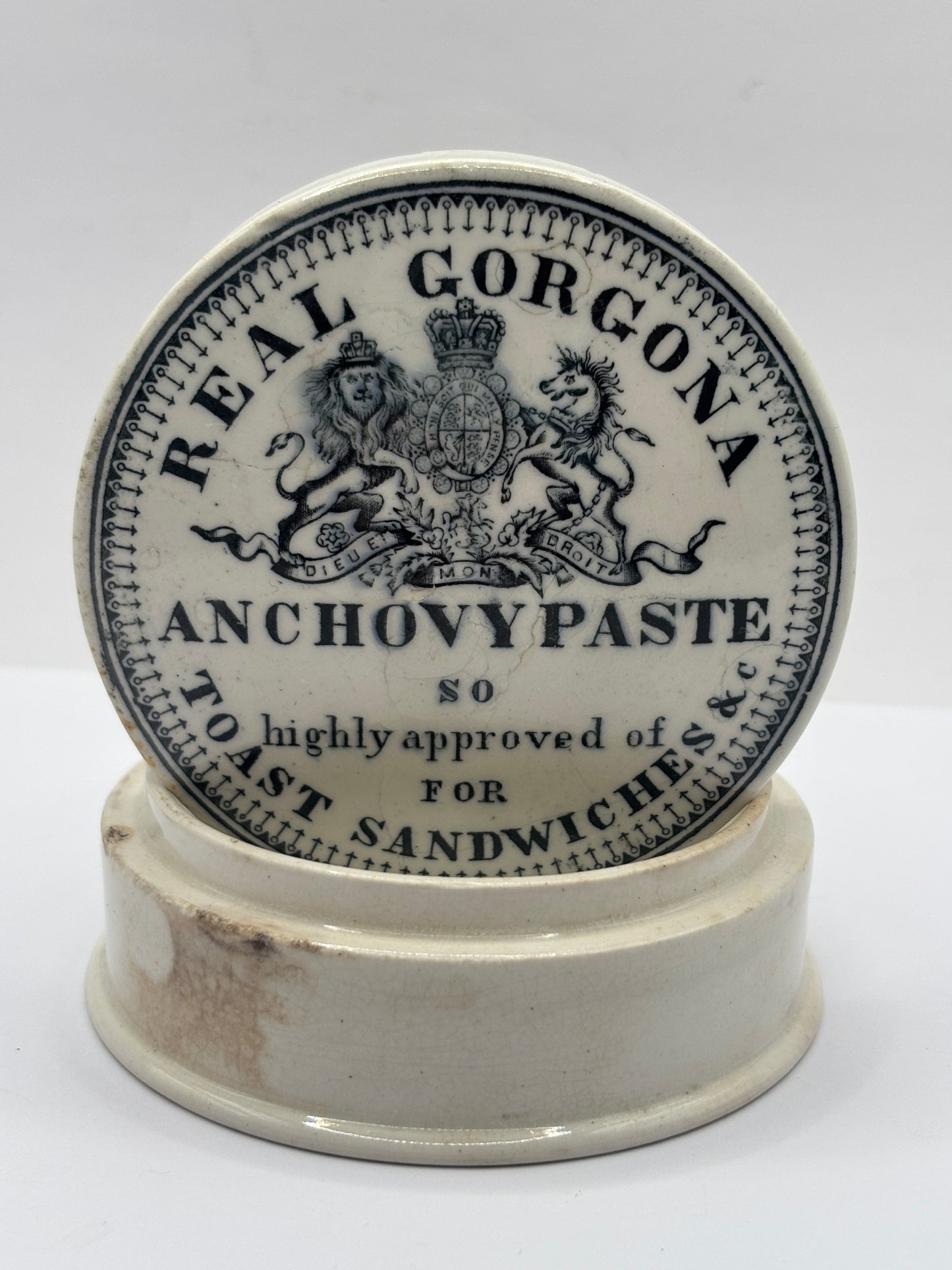 Old advertising lid and base. Real Gorgona anchovy paste. Chipped