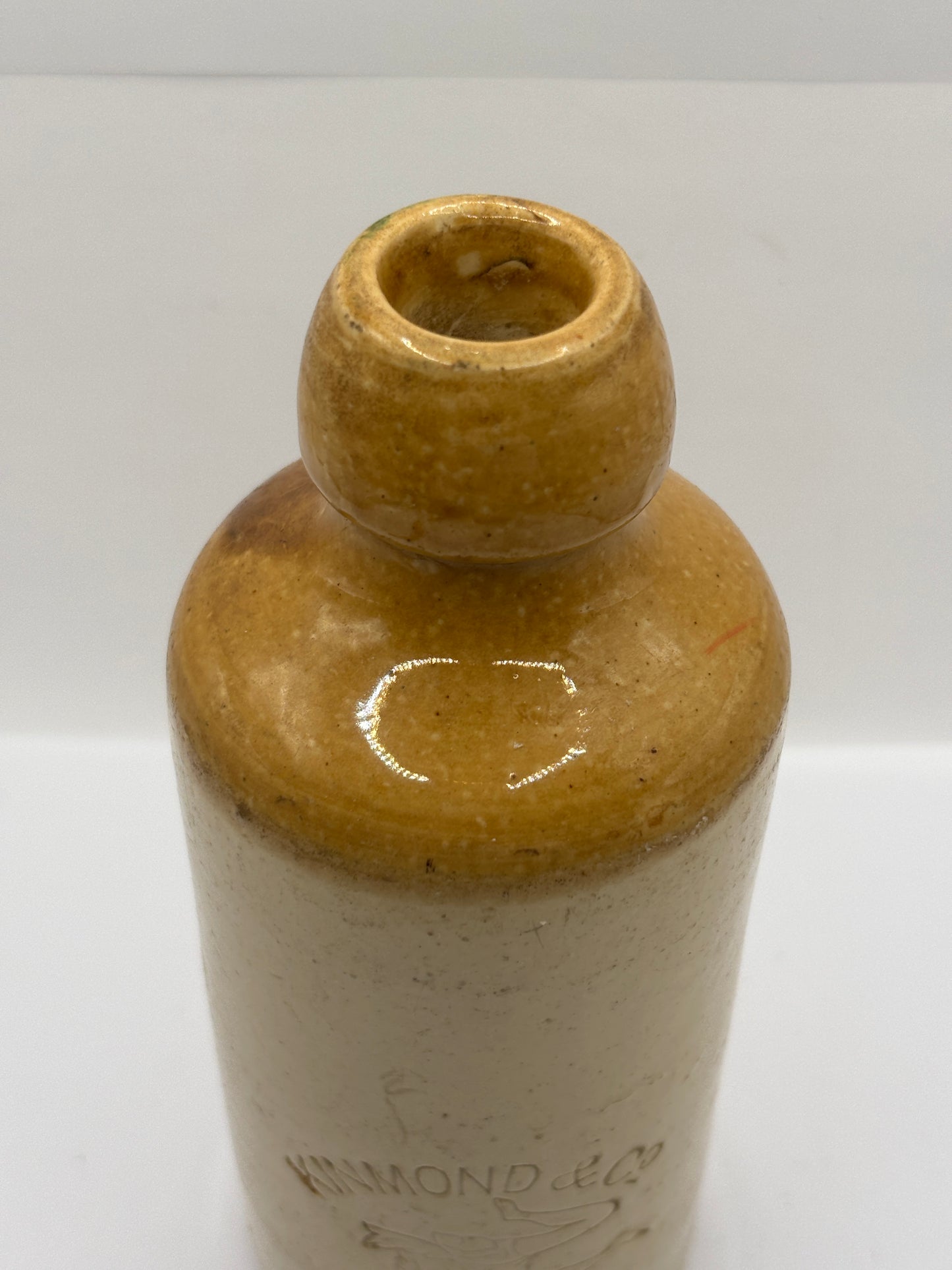 Old impressed stoneware ginger beer bottle, Kinmond & Co Leamington