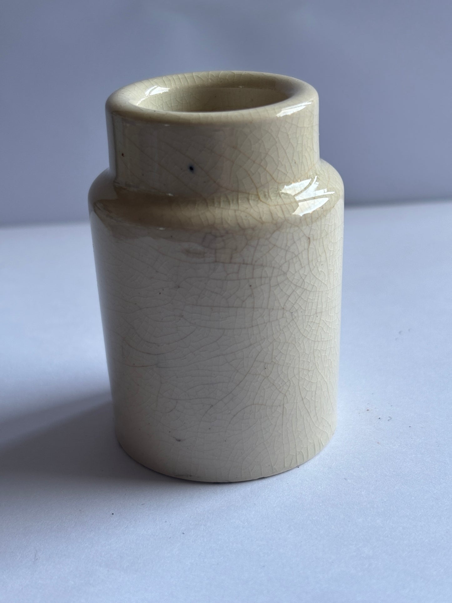 Old white stoneware pot