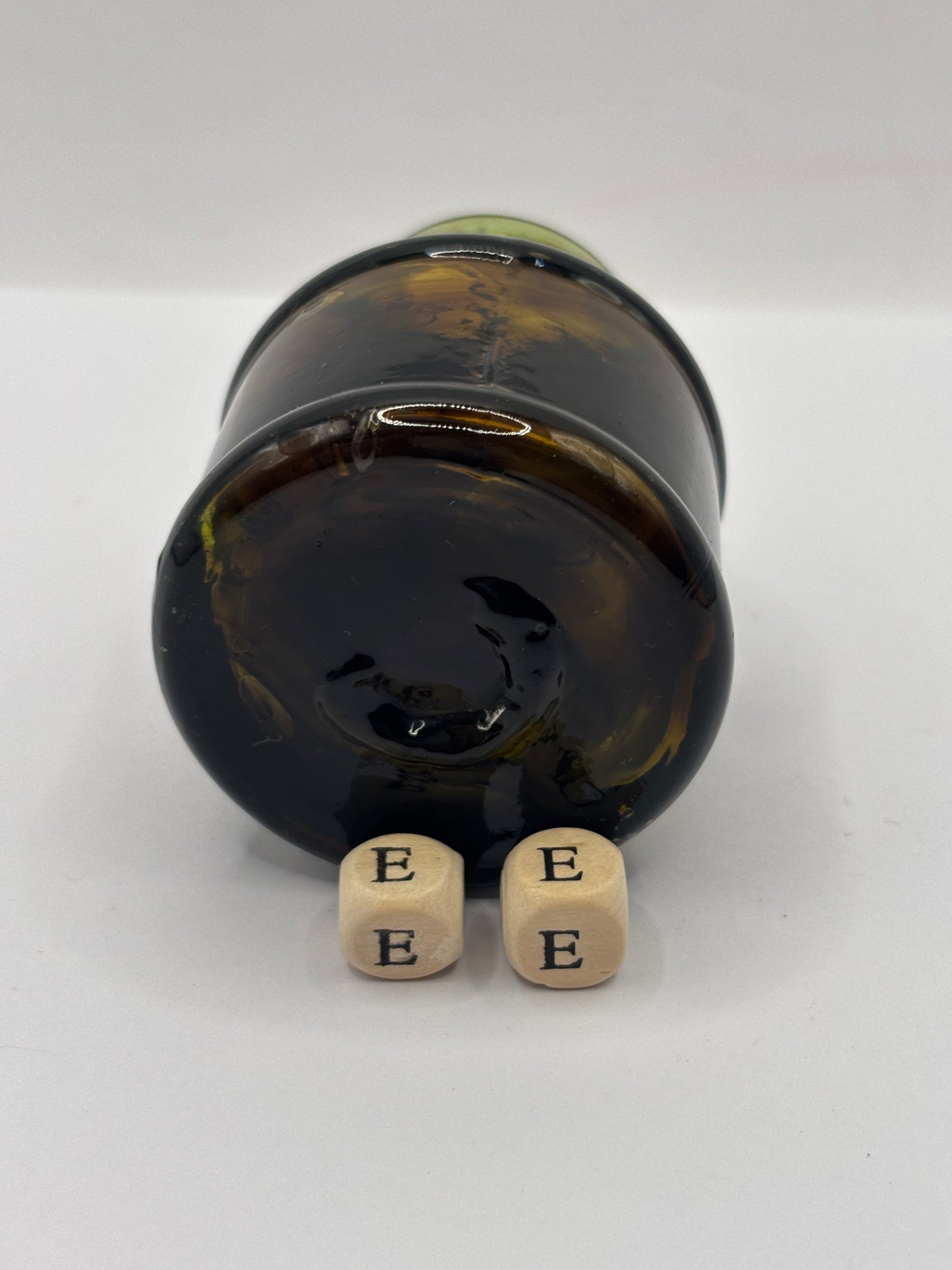 Old dark amber inkwell, ink bottle. Swirly (ee)