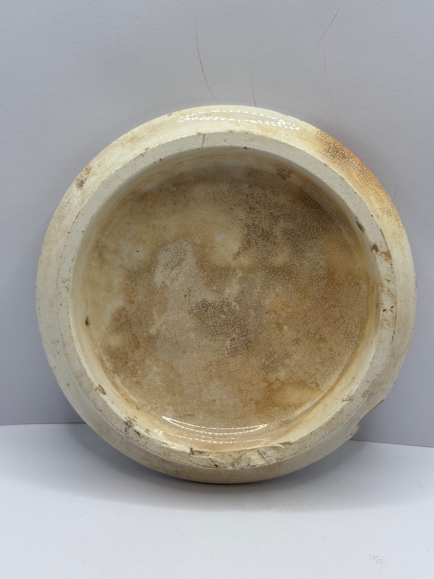 Old anchovy paste advertising pot lid, stained & crazed