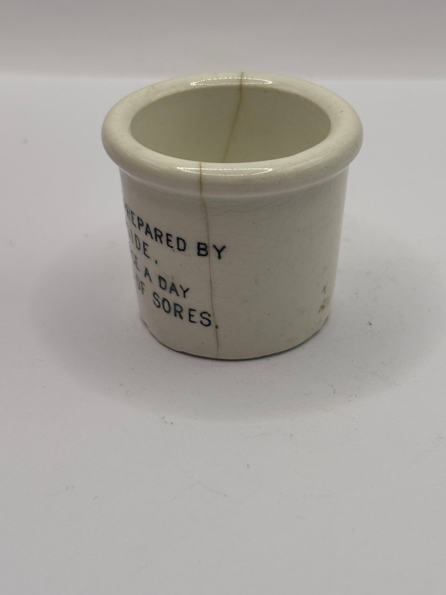 Old early advertising ointment pot, Handyside ointment