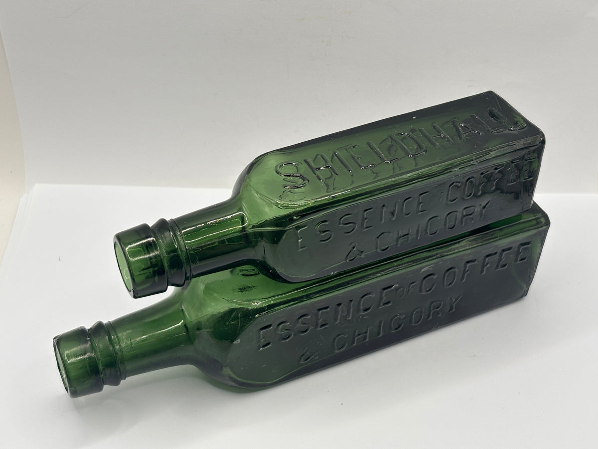 2 Old green glass essence of coffee bottles