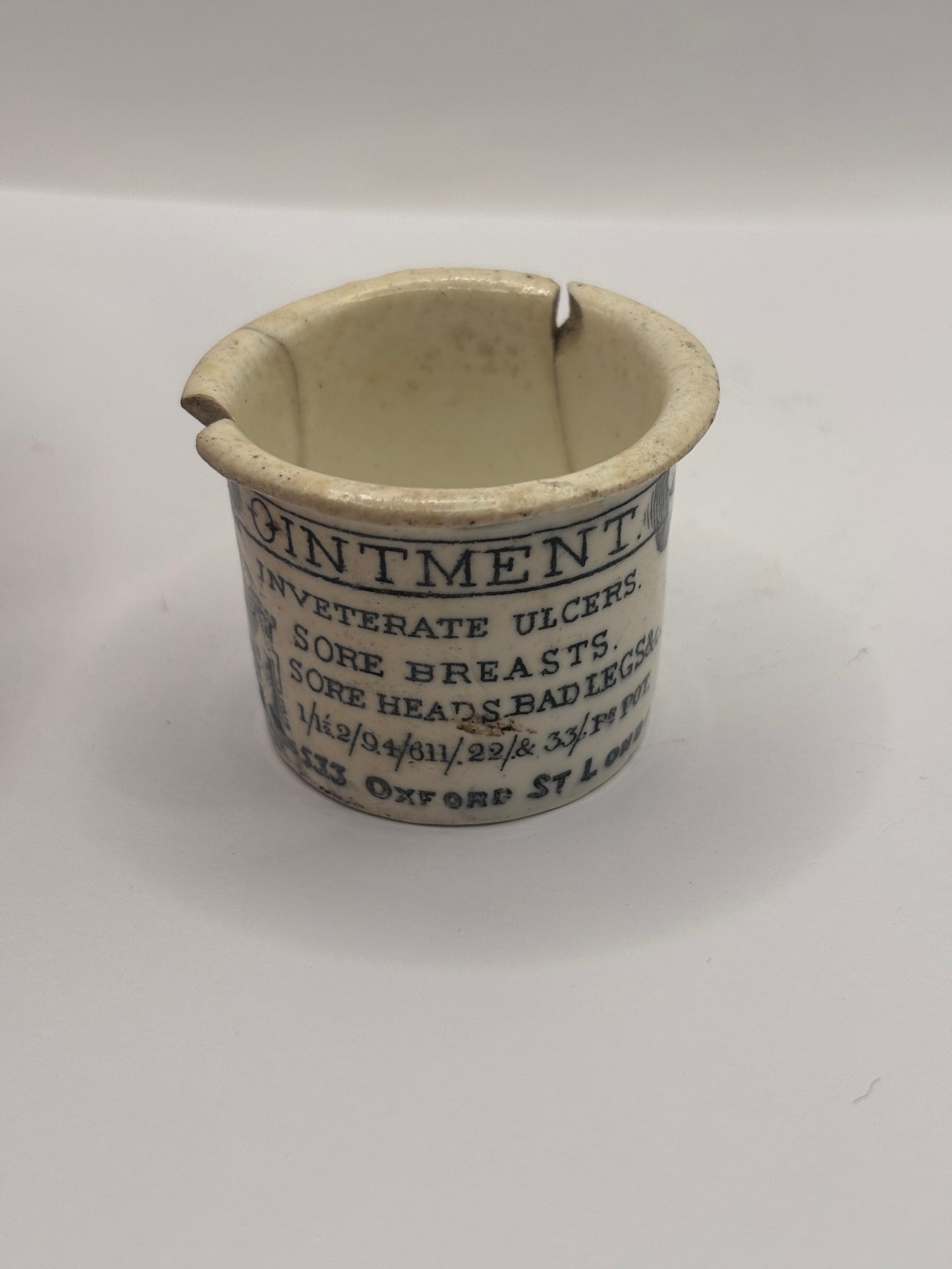 Old advertising ointment pot, Holloway’s ointment. Damaged