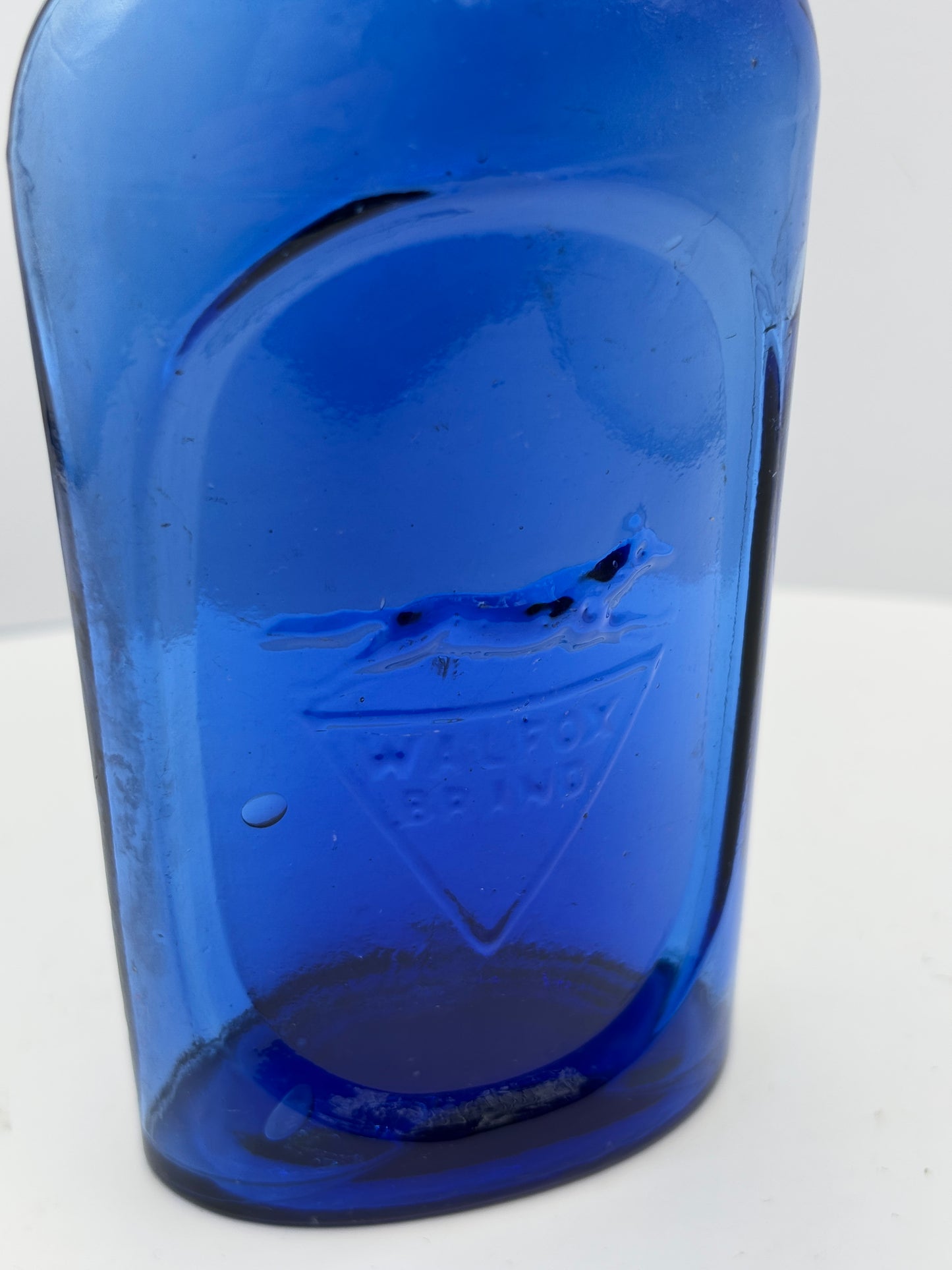 Old blue Walfox brand bottle