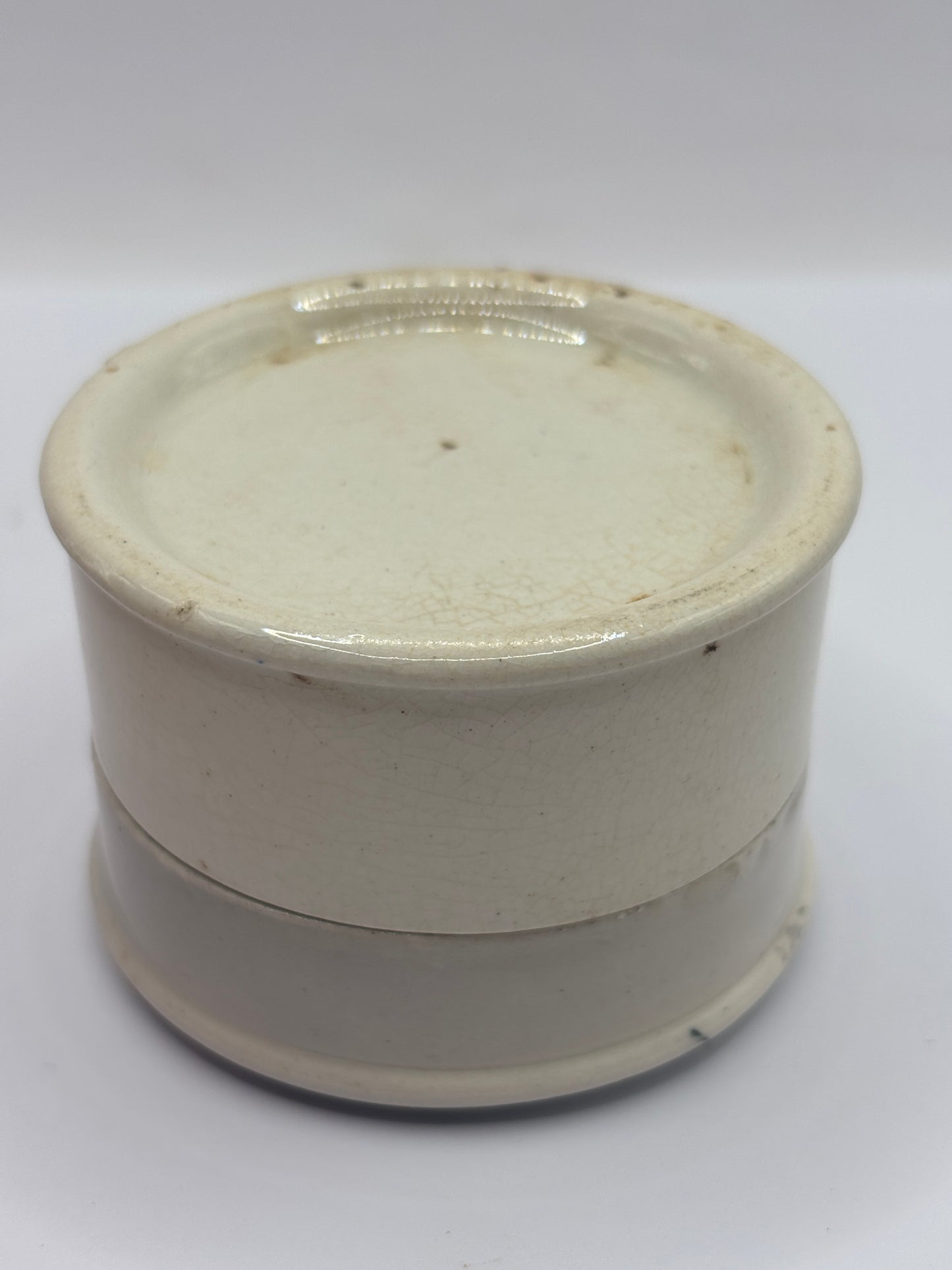Old advertising lid and base. Woods areca nut tooth paste