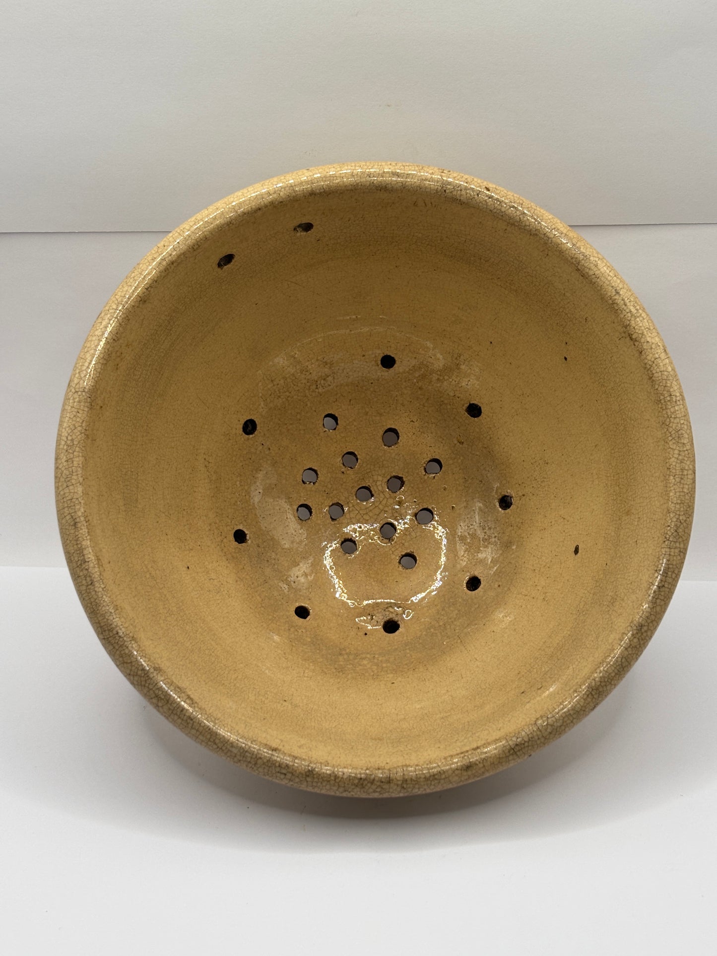 Old English stoneware strainer, crazed