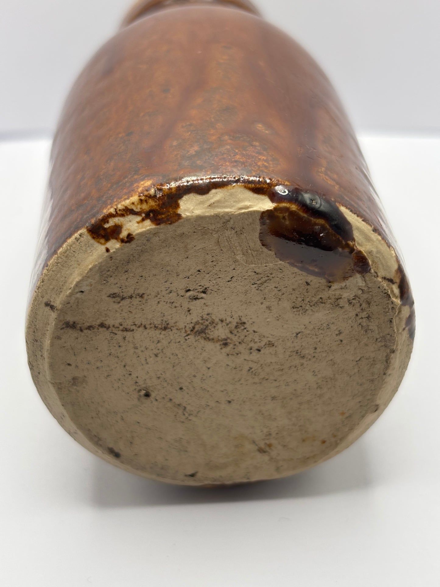 Old brown stoneware jar