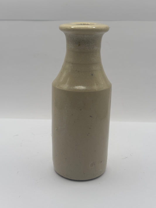 Old tall white stoneware bottle, ink? Polish?