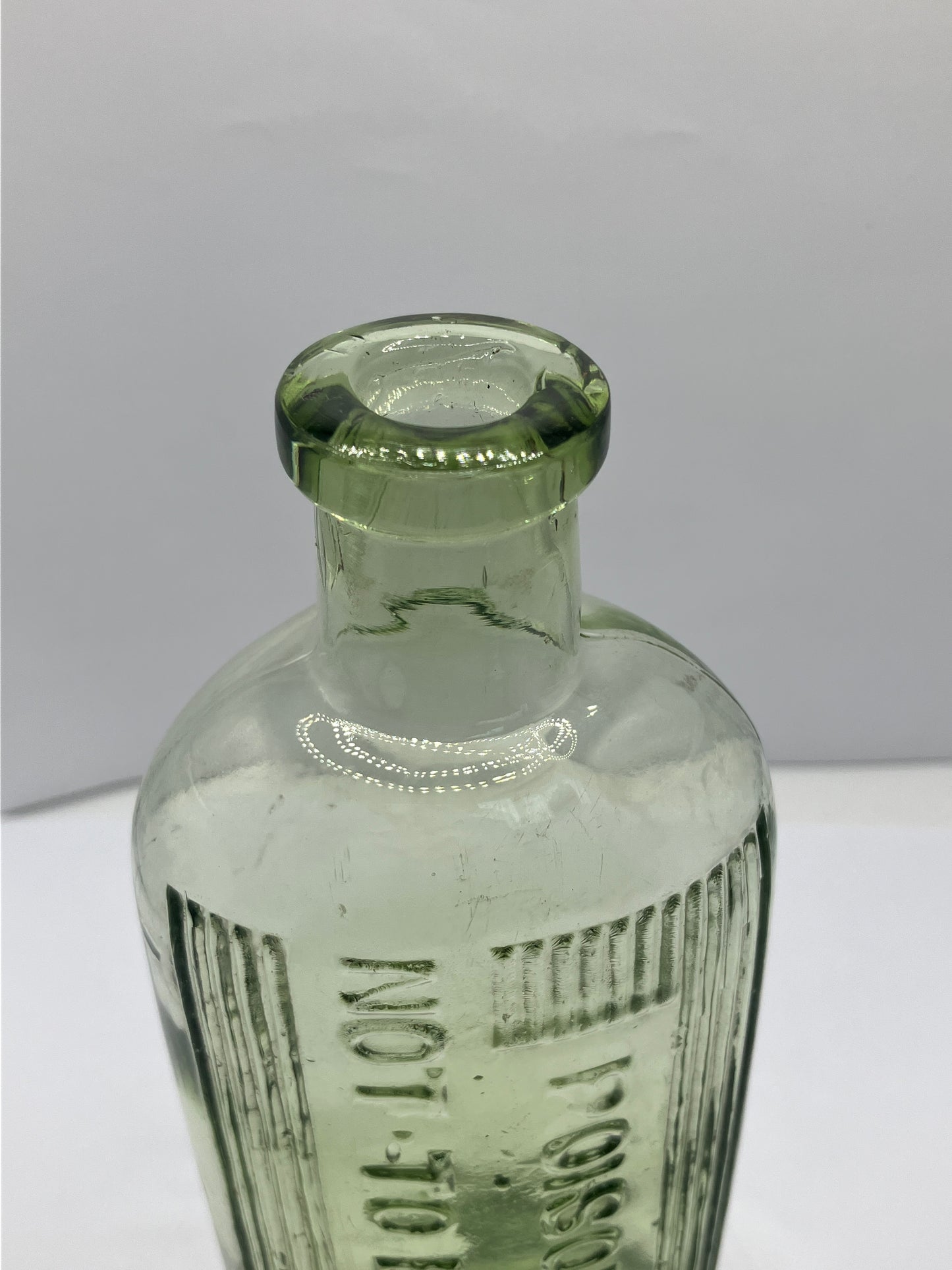 Green glass poison bottle, poisonous not to be taken