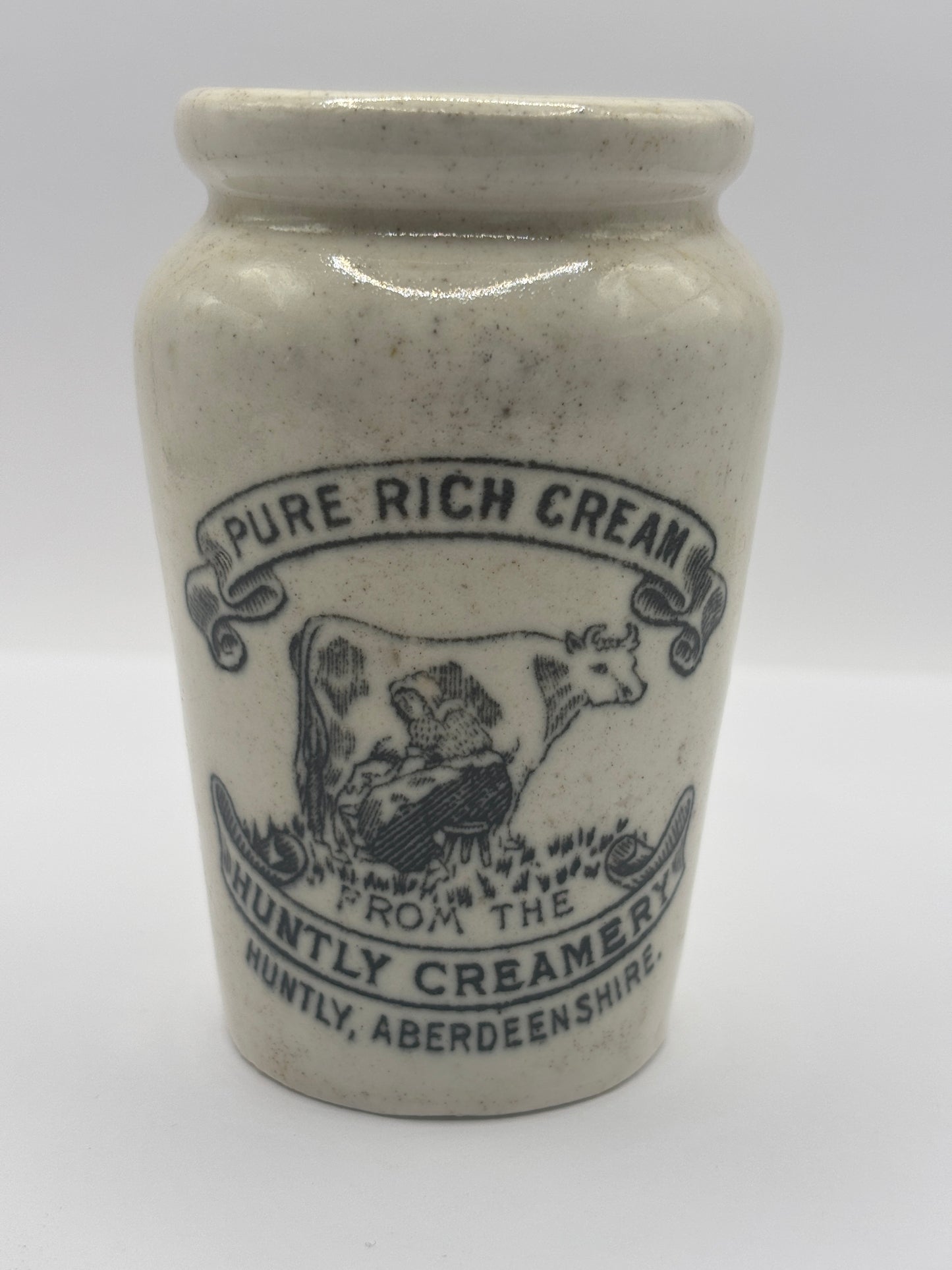 Old advertising cream pot, Huntly creamery. Milk maid. Pure rich cream