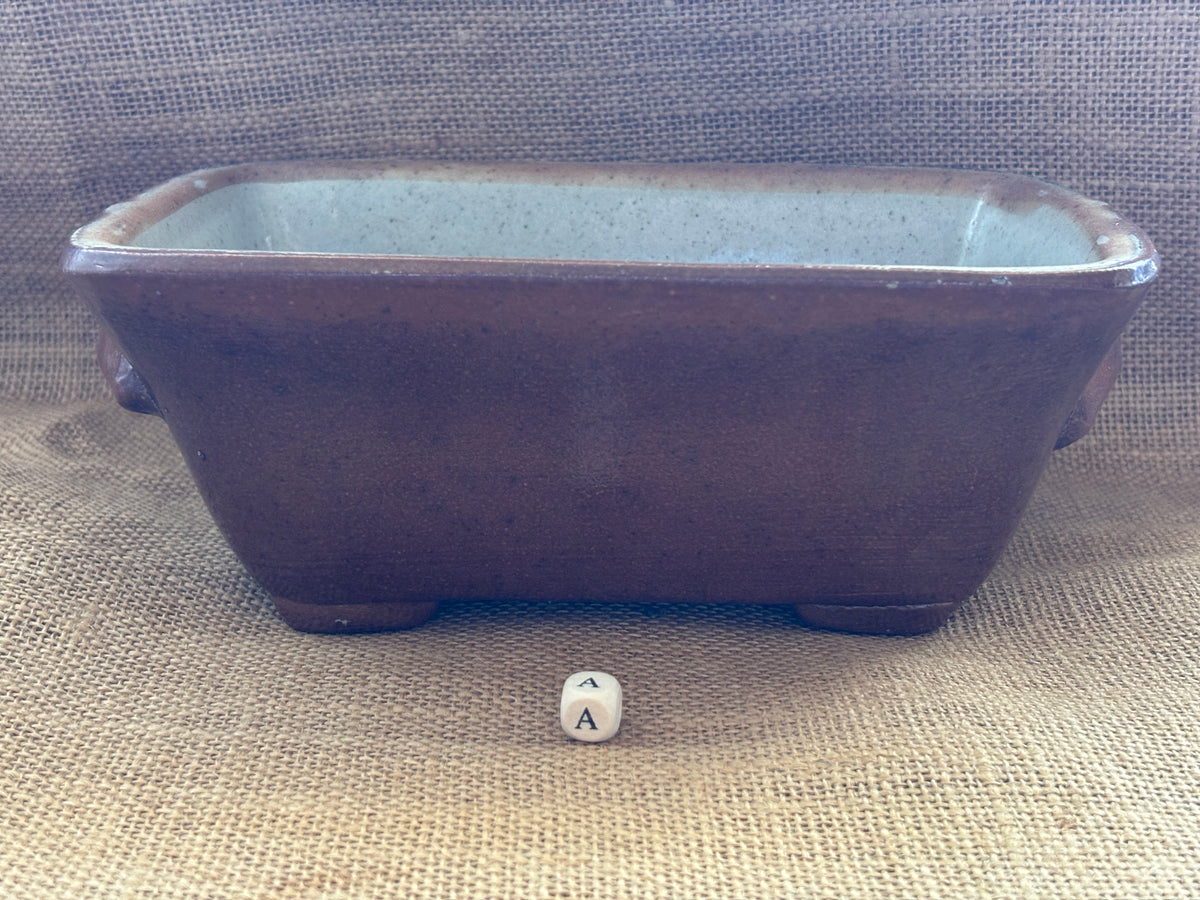 Old brown salt glaze stoneware pie dish (a)
