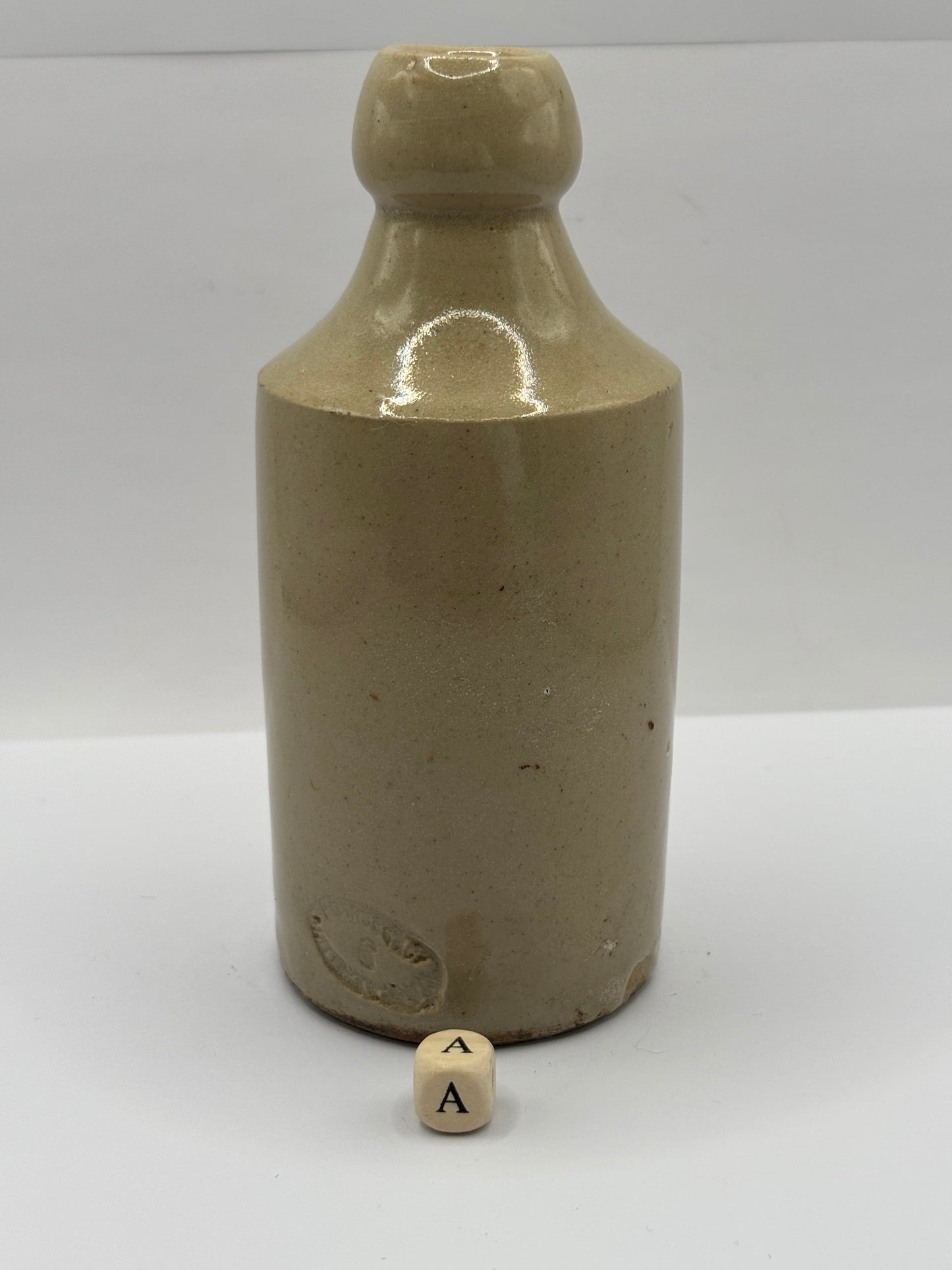 Old small plain stoneware ginger beer bottle (a) 13cms