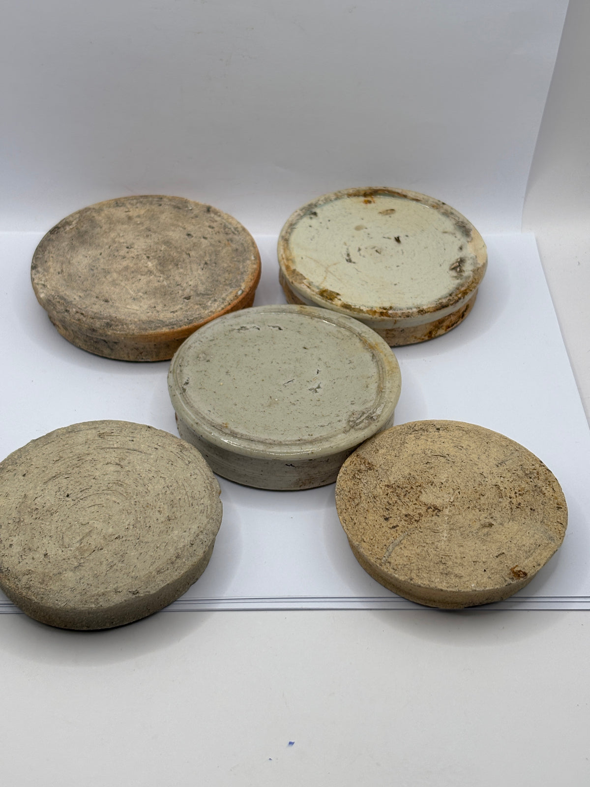 5 old stoneware ginger jar lids, stackers