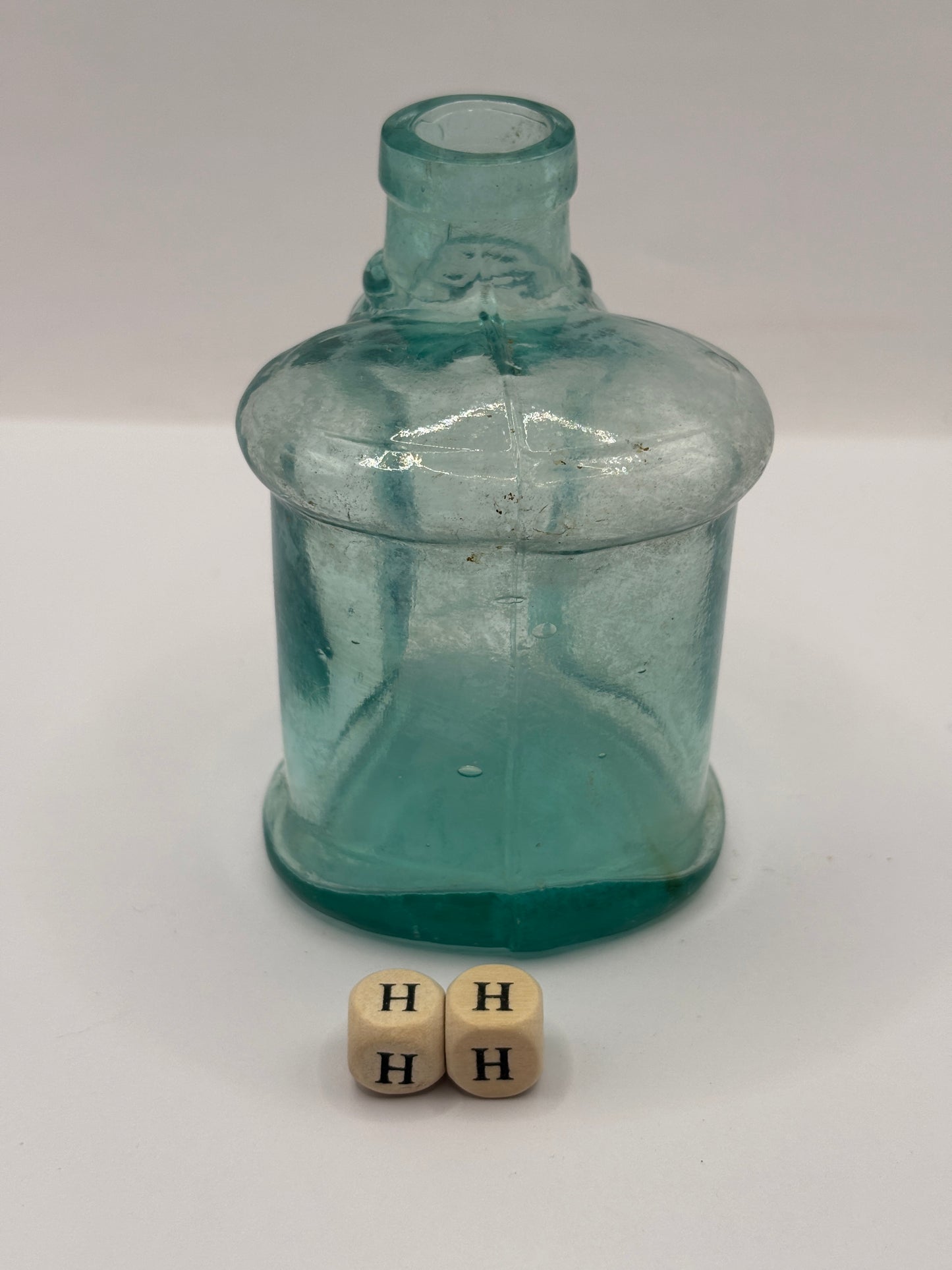 Old aqua glass inkwell (HH)