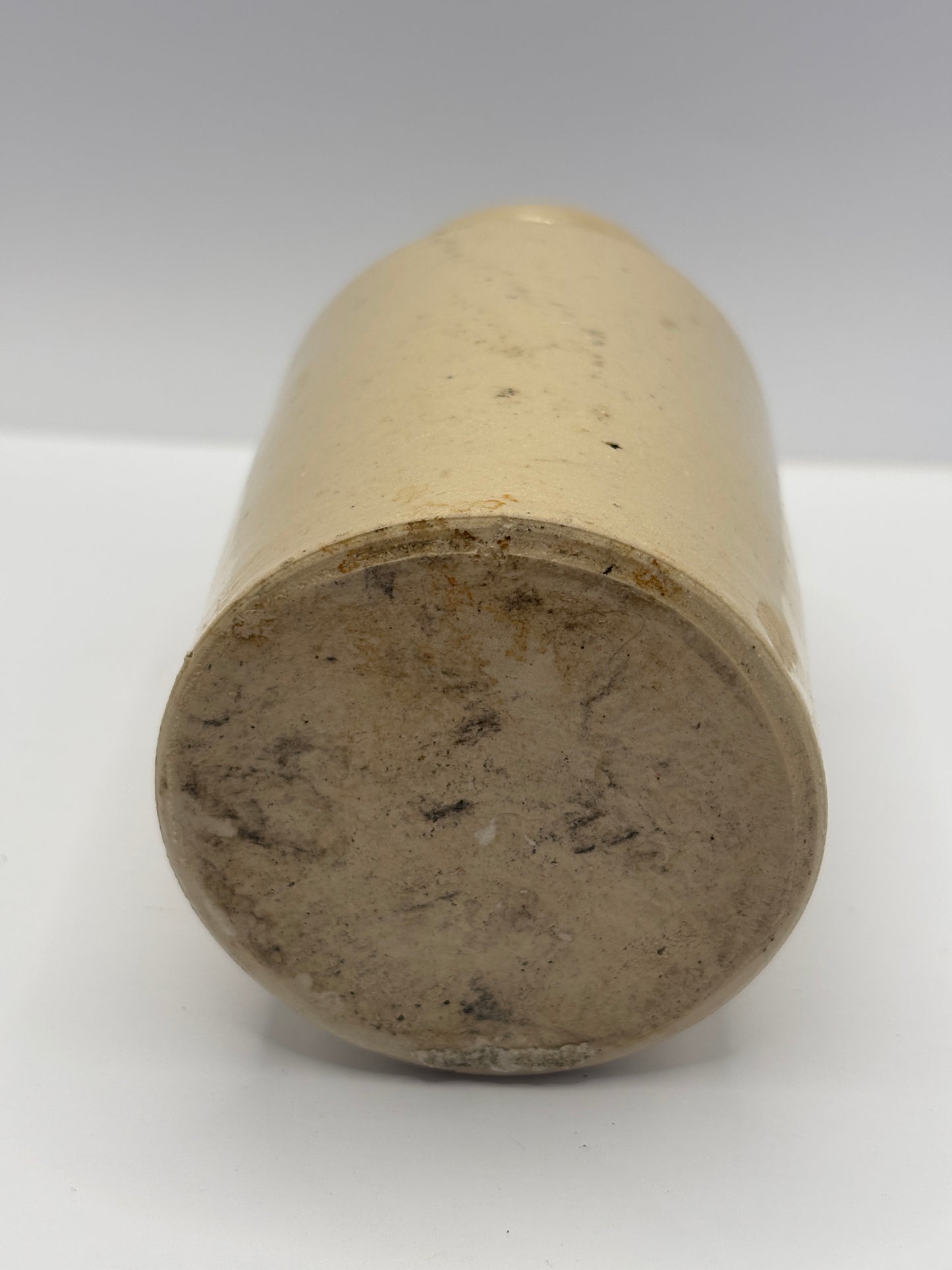Old white stoneware jar, small vase