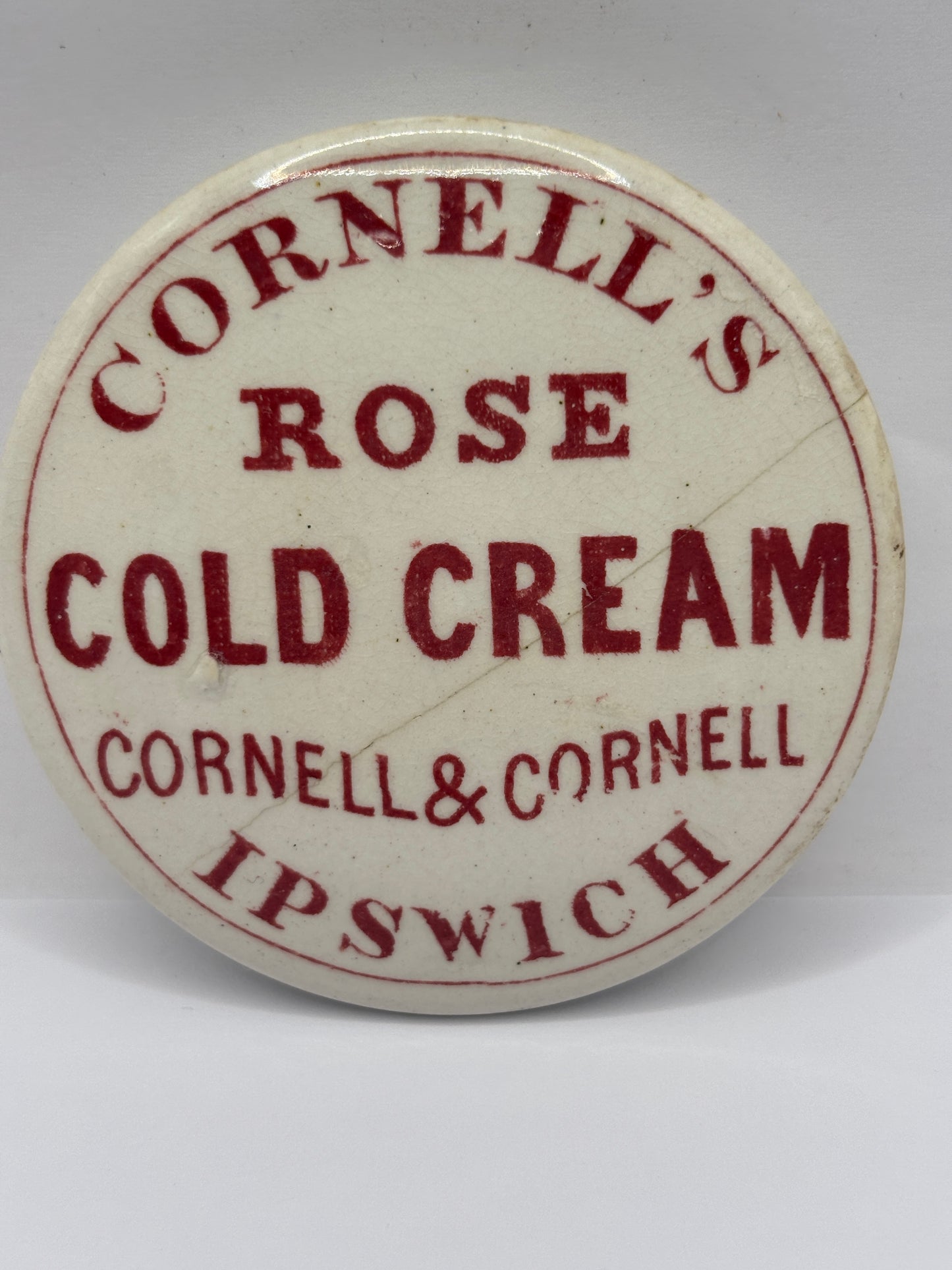 Old red print advertising lid, Cornells rose cold cream