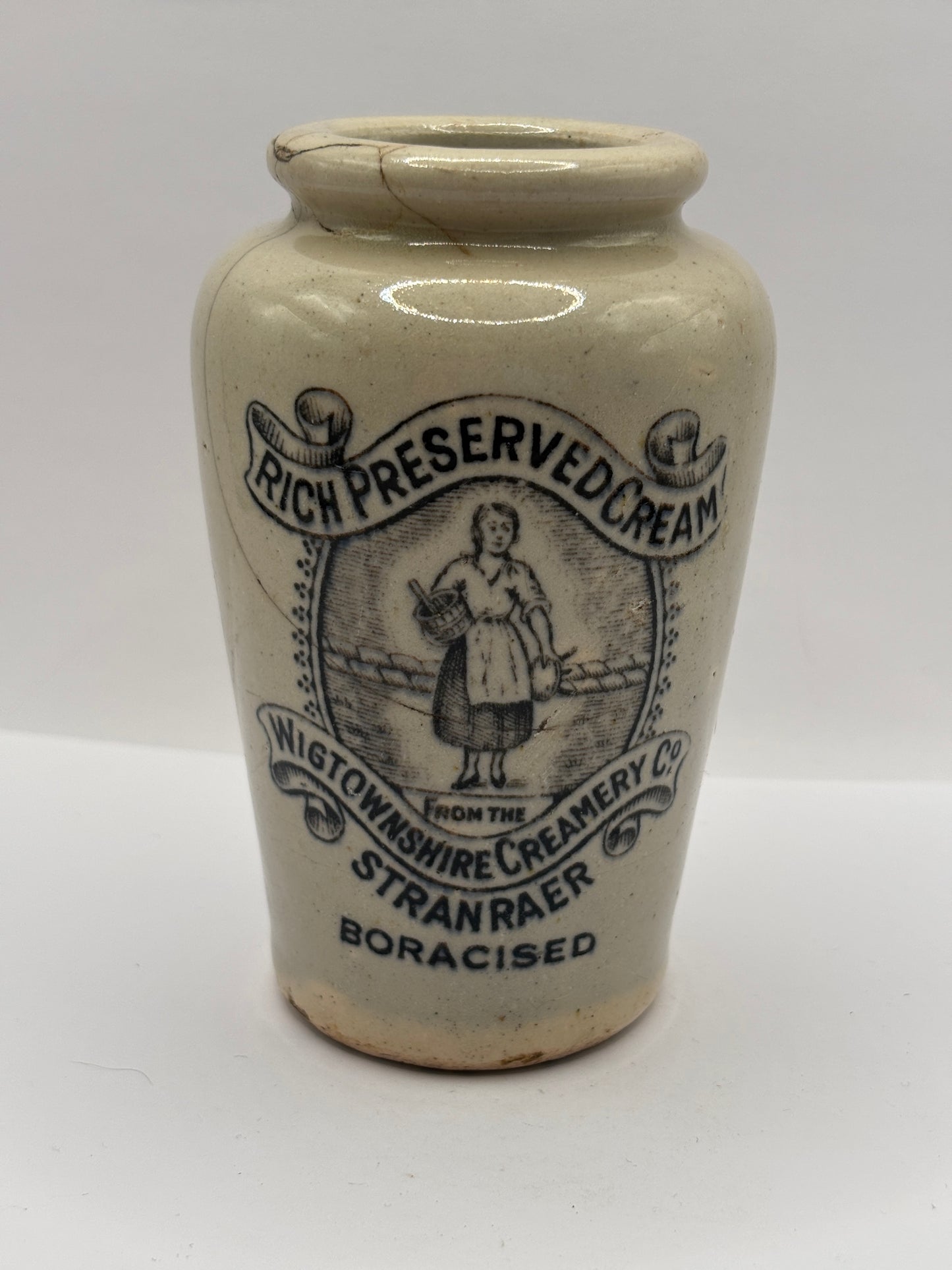 Old advertising cream pot, Rich preserved cream, Stranraer. Milk maid. damaged