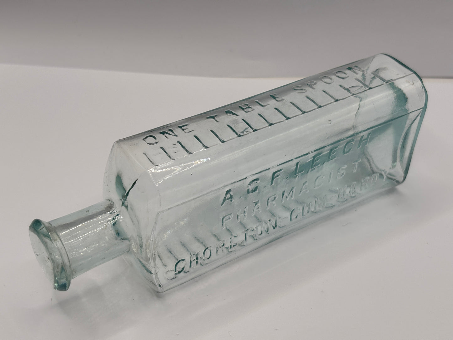 Old aqua glass chemist bottle, AGF LEECH PHARMACIST
