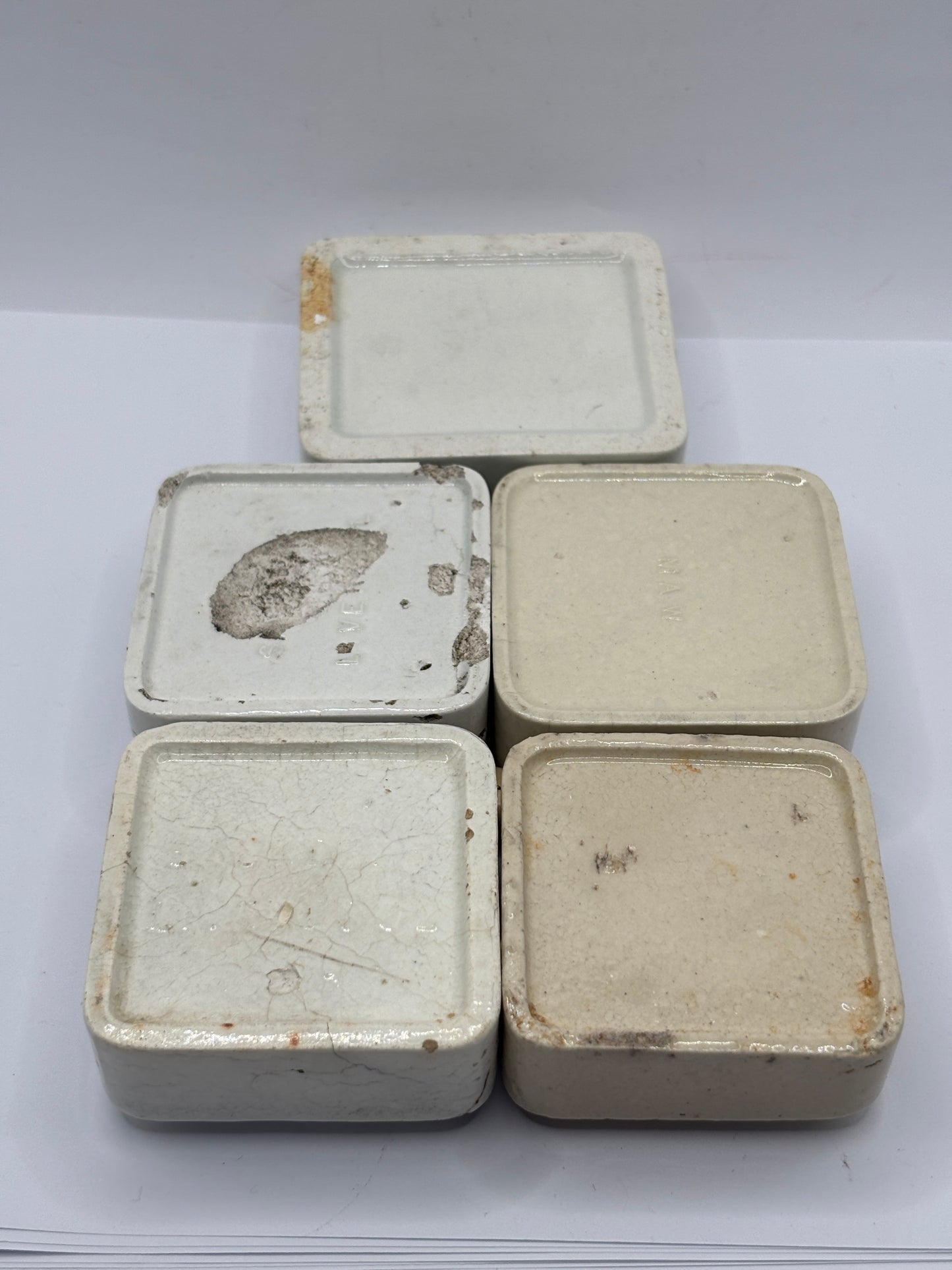5 old square bases, stackers (K) damages