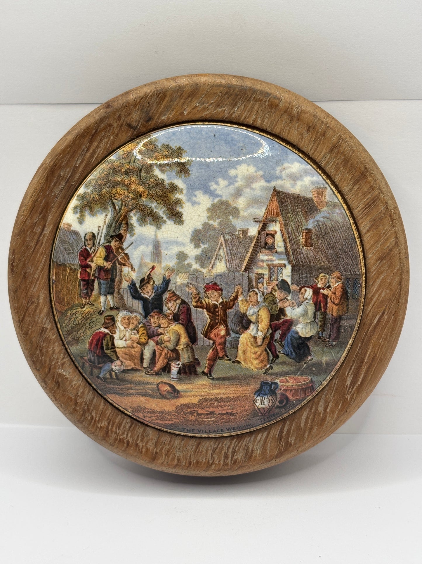 Old Prattware lid, The village wedding. In original wooden frame
