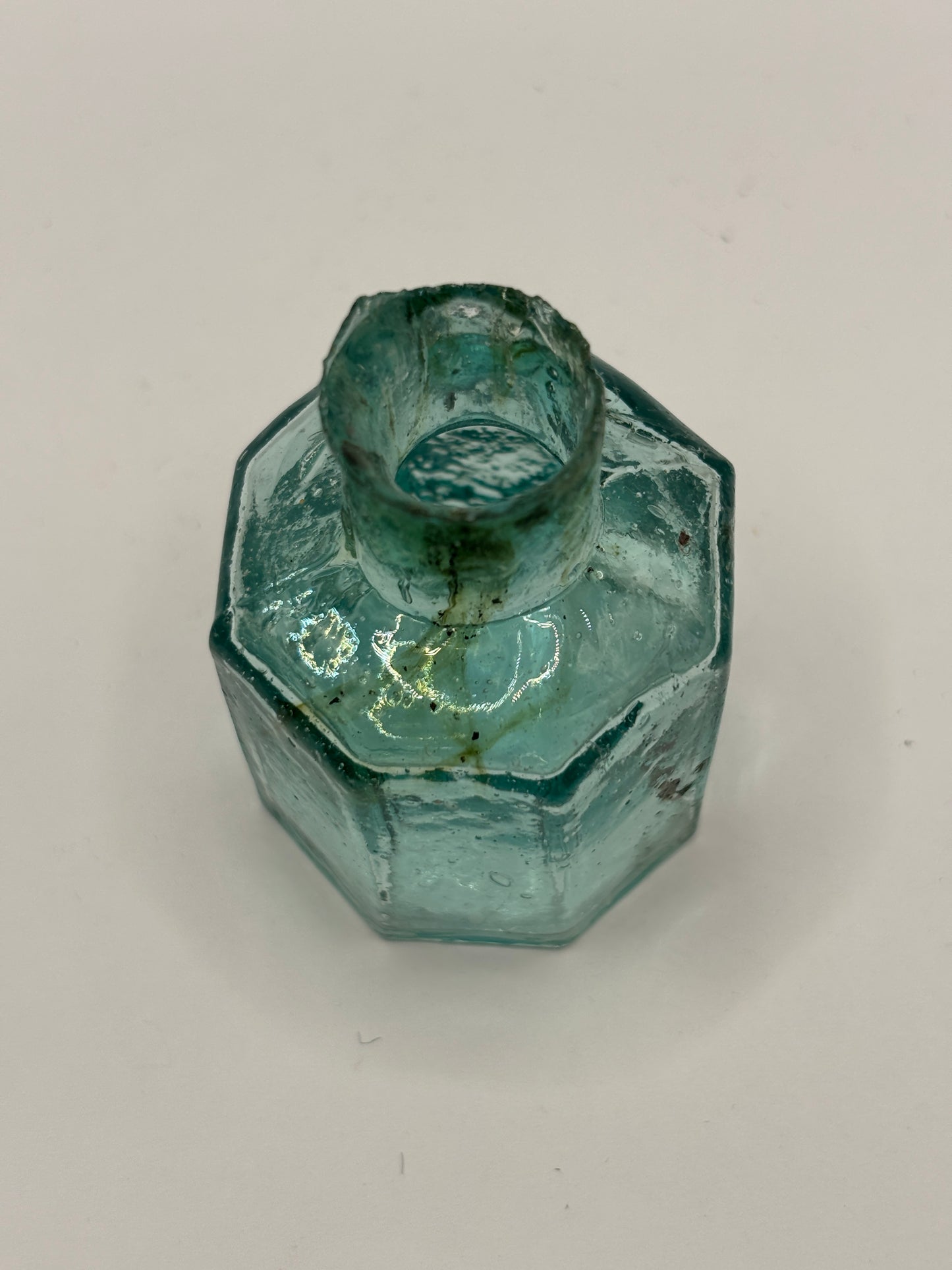 Old aqua glass inkwell with swirls, penny ink, ink bottle