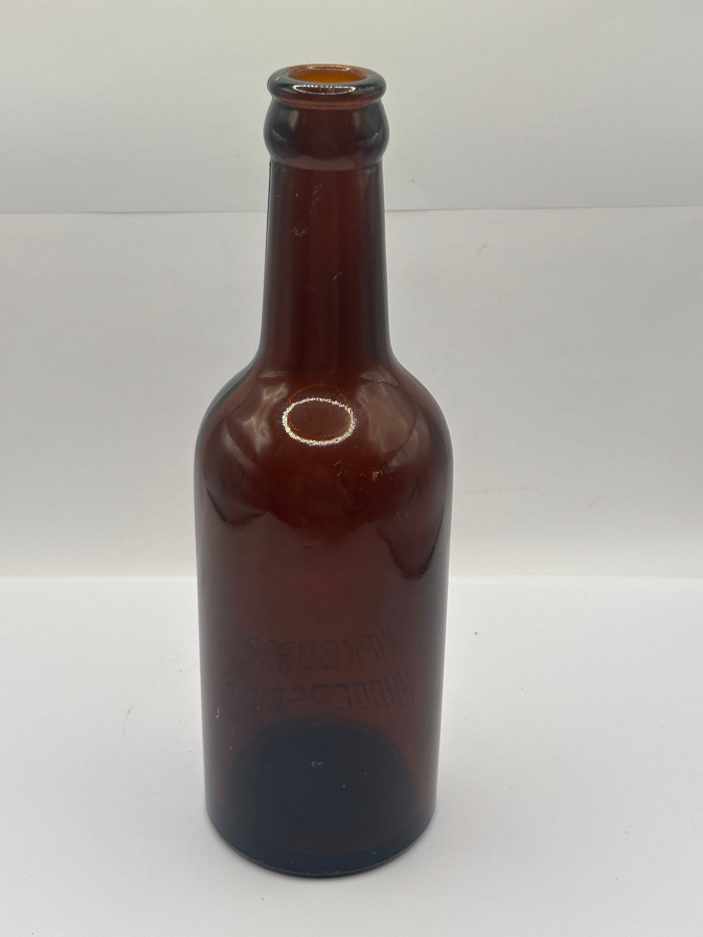 Old advertising glass beer bottle, Huddersfield