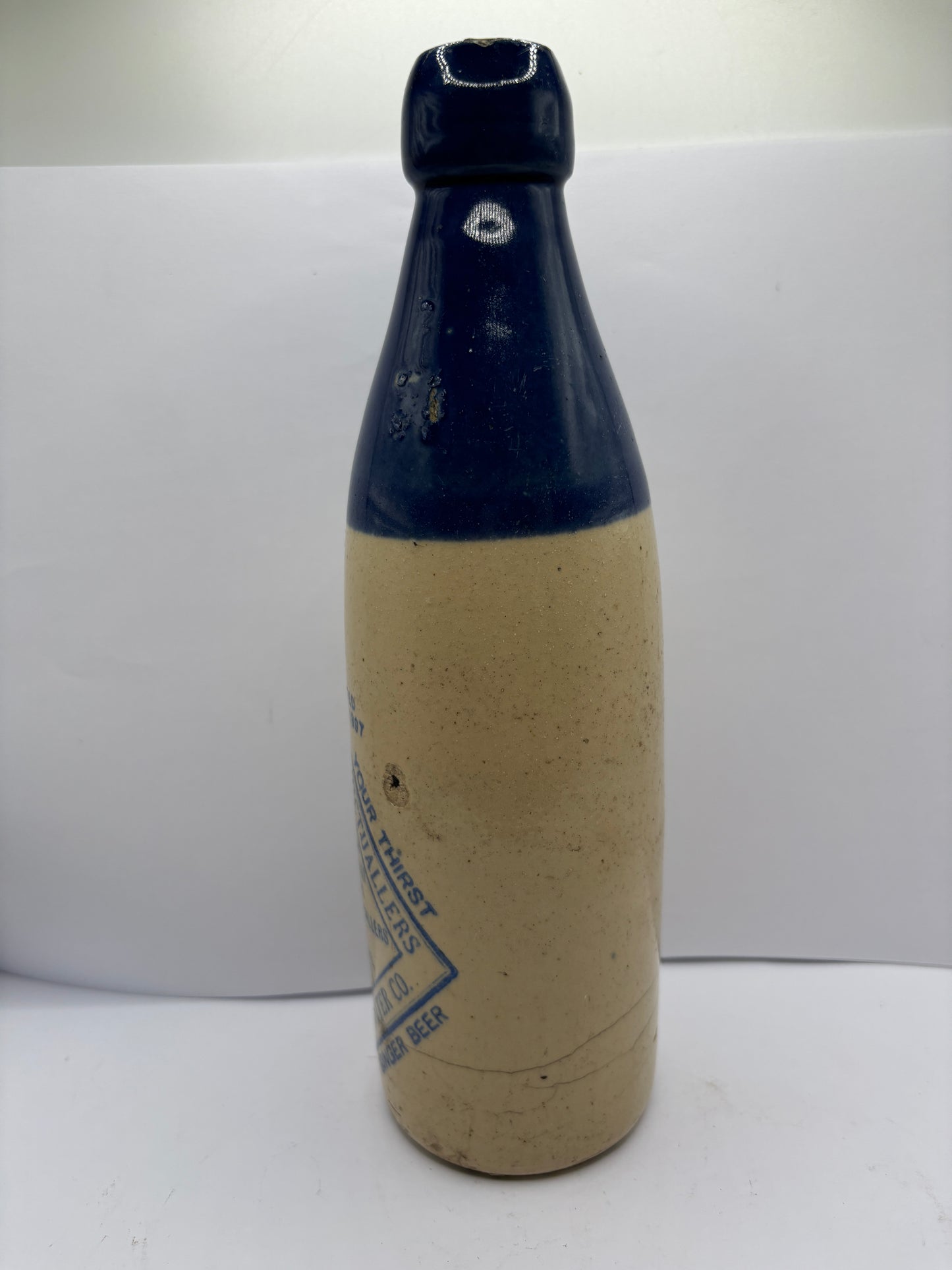 Old blue top ginger beer bottle