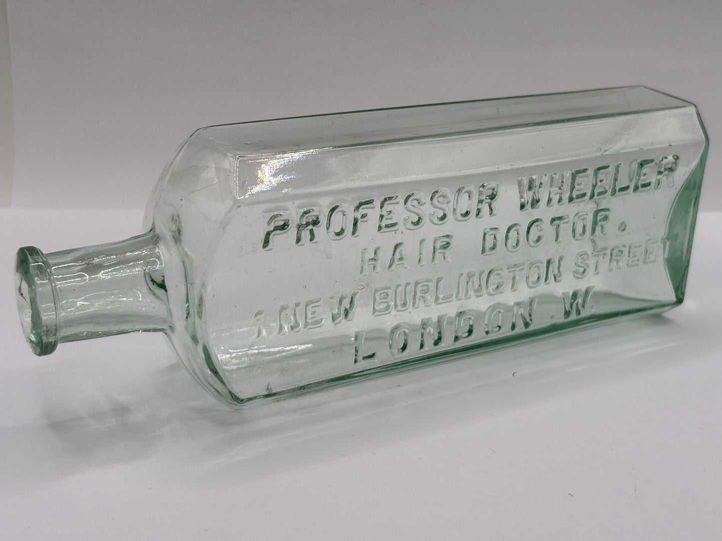 Old advertising chemist bottle, Professor Wheeler hair doctor London