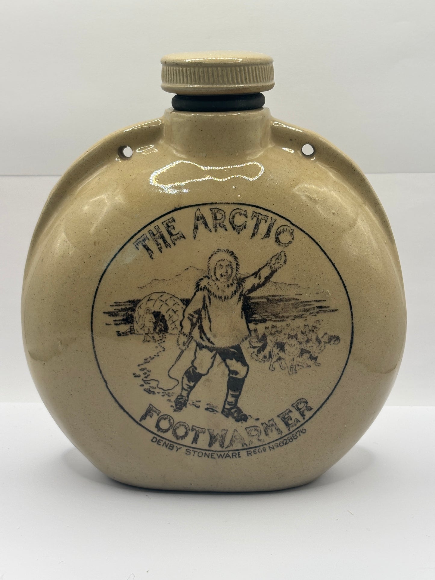 Old stoneware advertising foot warmer, The Arctic Footwarmer