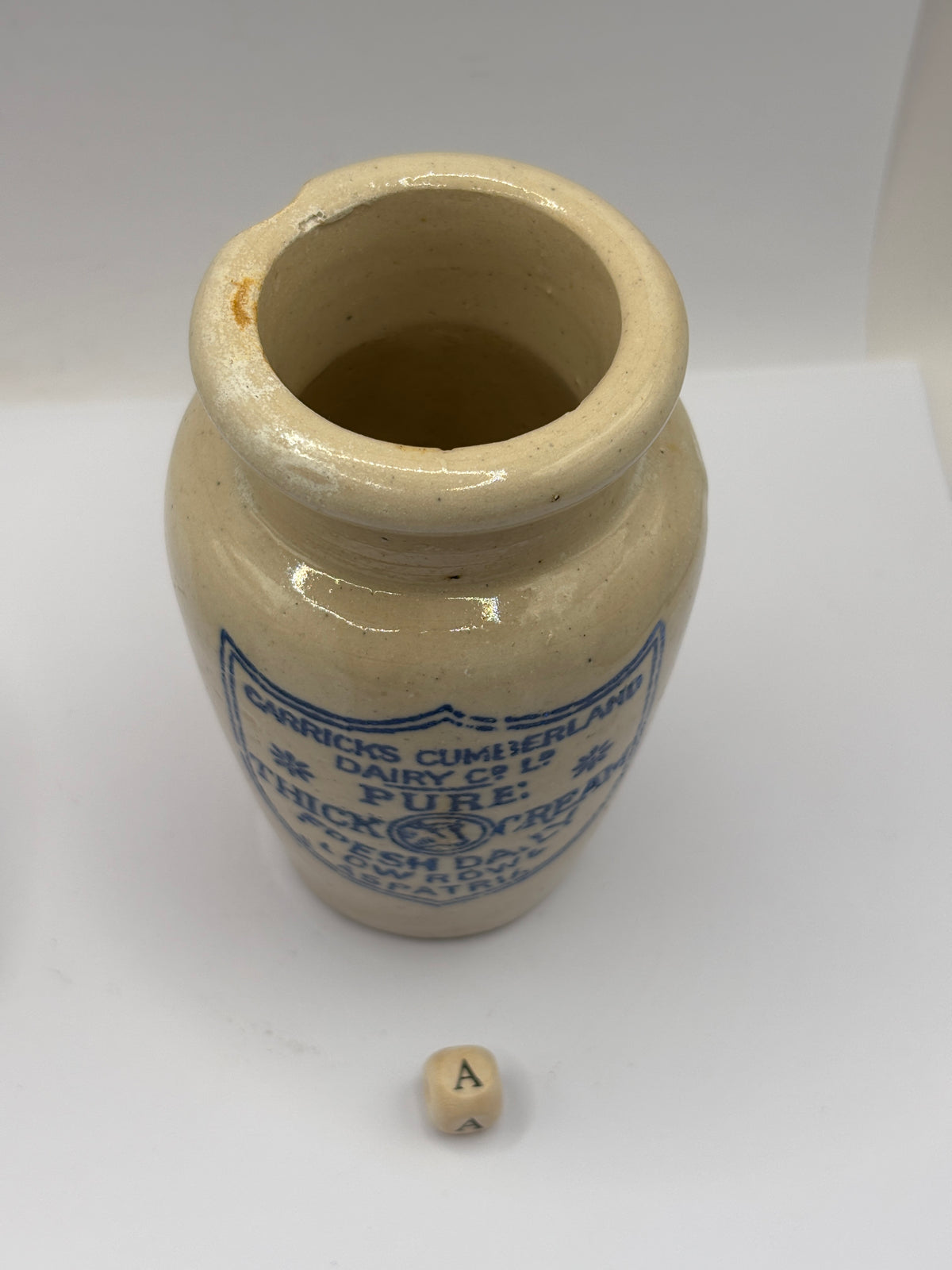 Old advertising cream pot, Carricks Cumberland dairy (a)