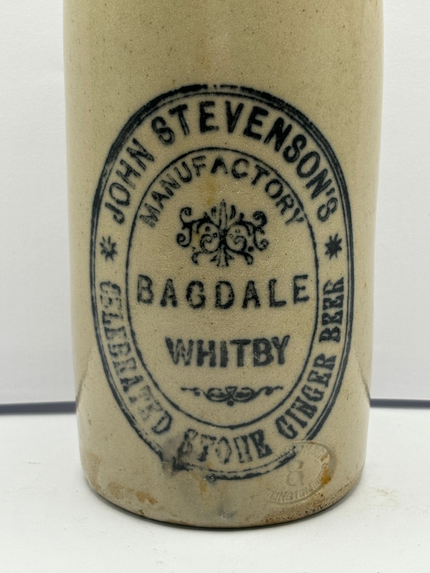 White stoneware ginger beer bottle, Bagdale whitby