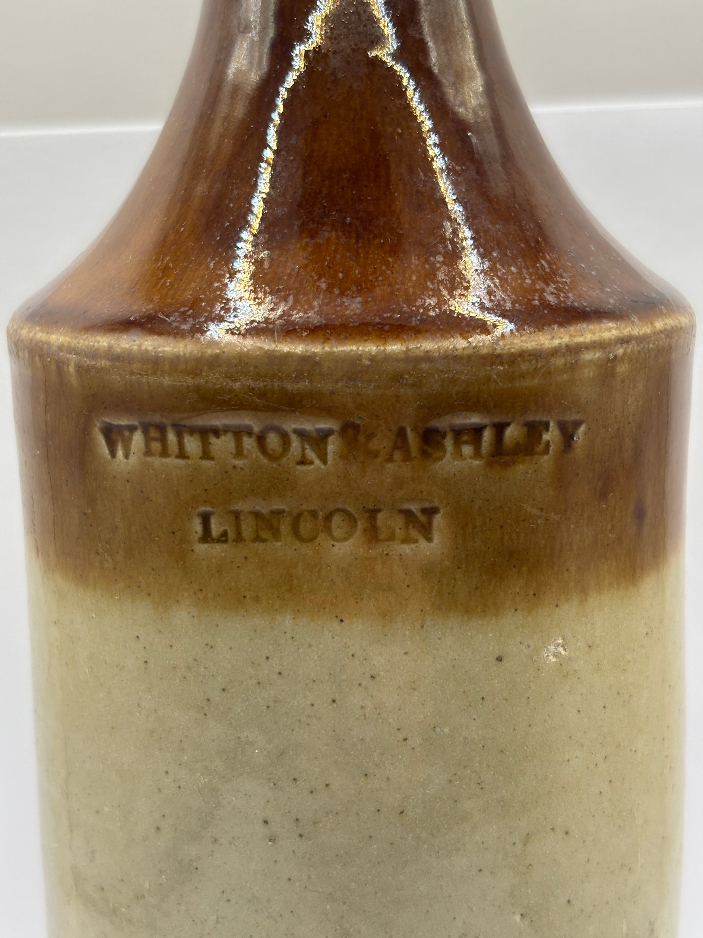 Old Lincoln stoneware bottle. porter. Whitton & ashley